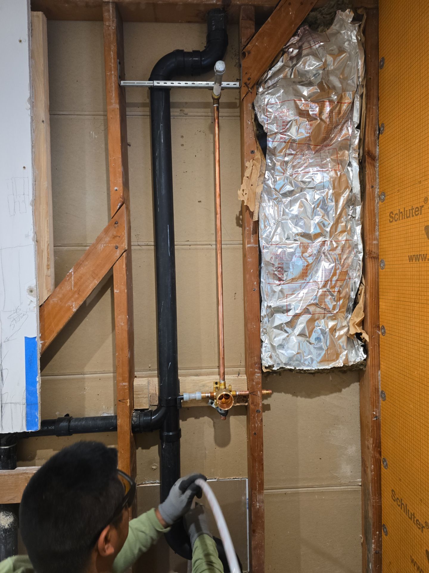 Installation of New Tall Black Piping (Wall to Ceiling) & Underground Piping by Us Plumbing