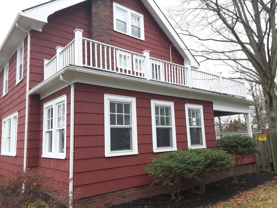 Residential Roof Replacement using Patio Roof by Absolute Roofing and Construction