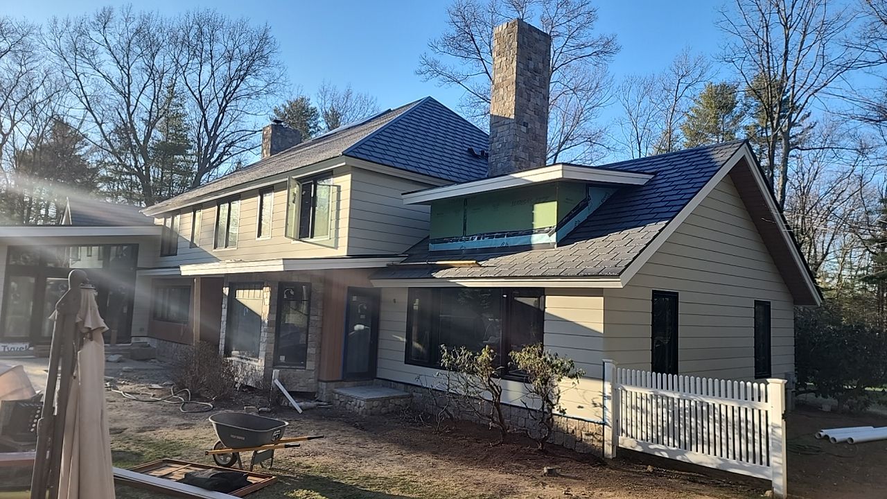 Siding in Weston,  MA by UBrothers Construction
