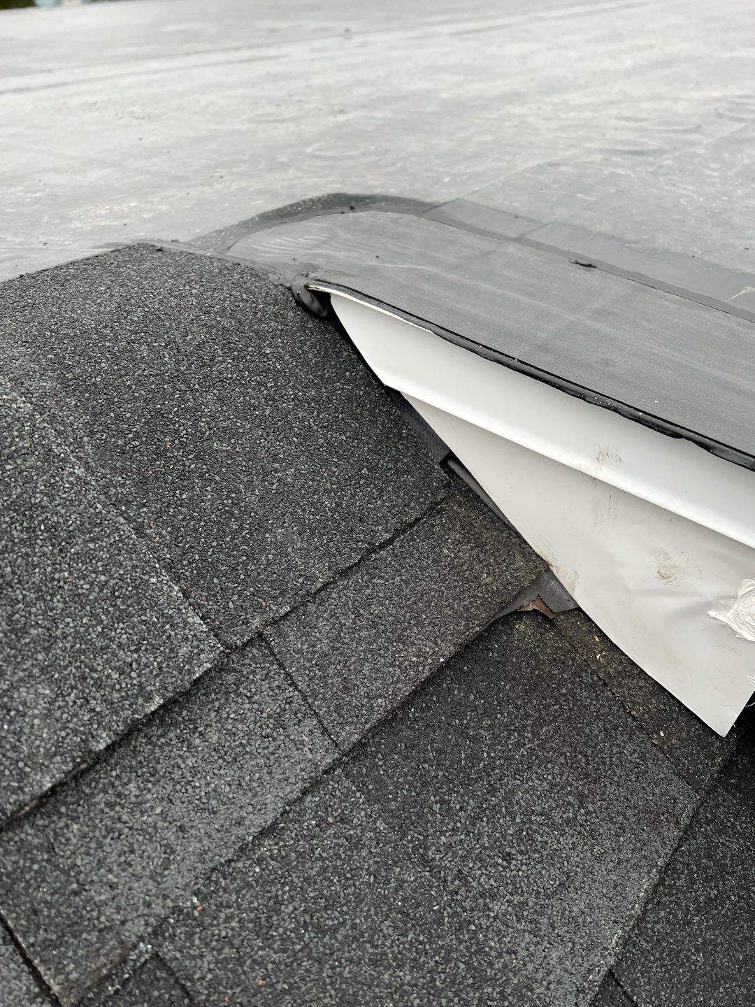 Residential Roofing Installation using 60 mil rubber roof by Nitro Roofing and Construction