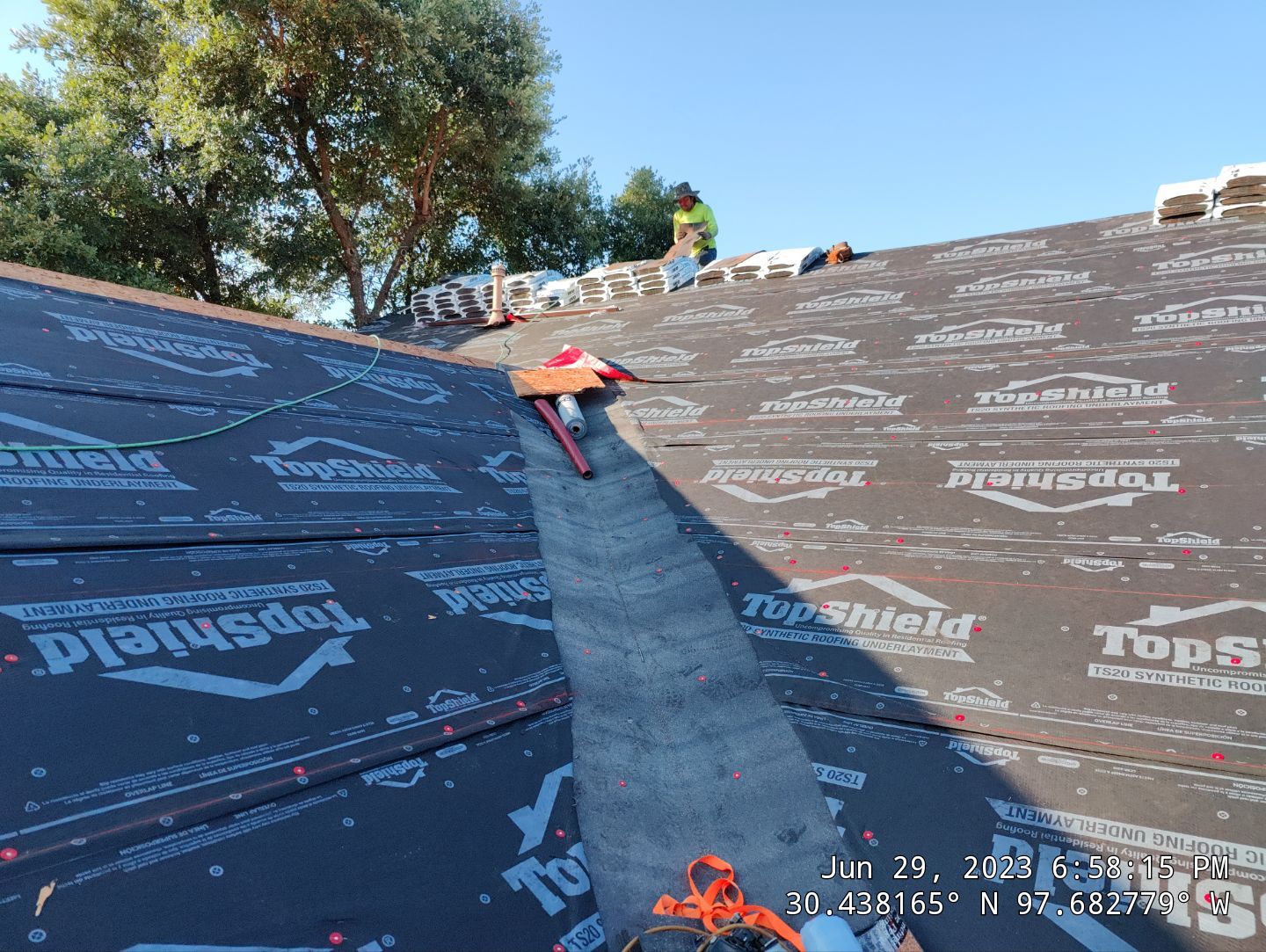 New Roof Installation Of IKO Dynasty Color Brownstone by DeZign Roofing & Exteriors