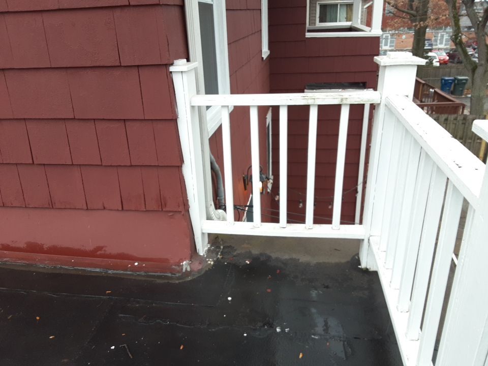 Residential Roof Replacement using Patio Roof by Absolute Roofing and Construction