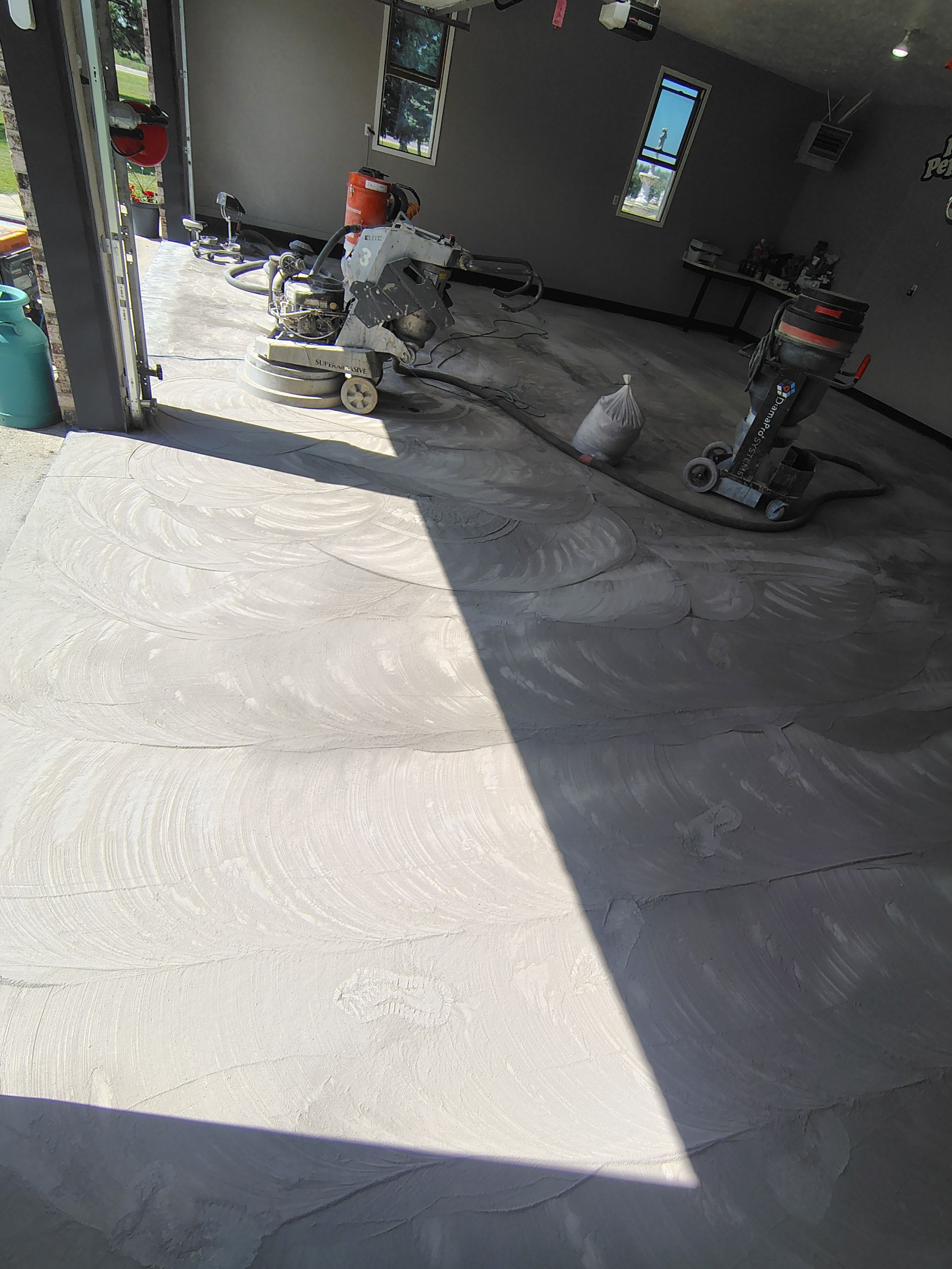 Garage Concrete Floor Coating and Crack Repair in Onawa by Select Painting, Coatings & Garage Cabinets