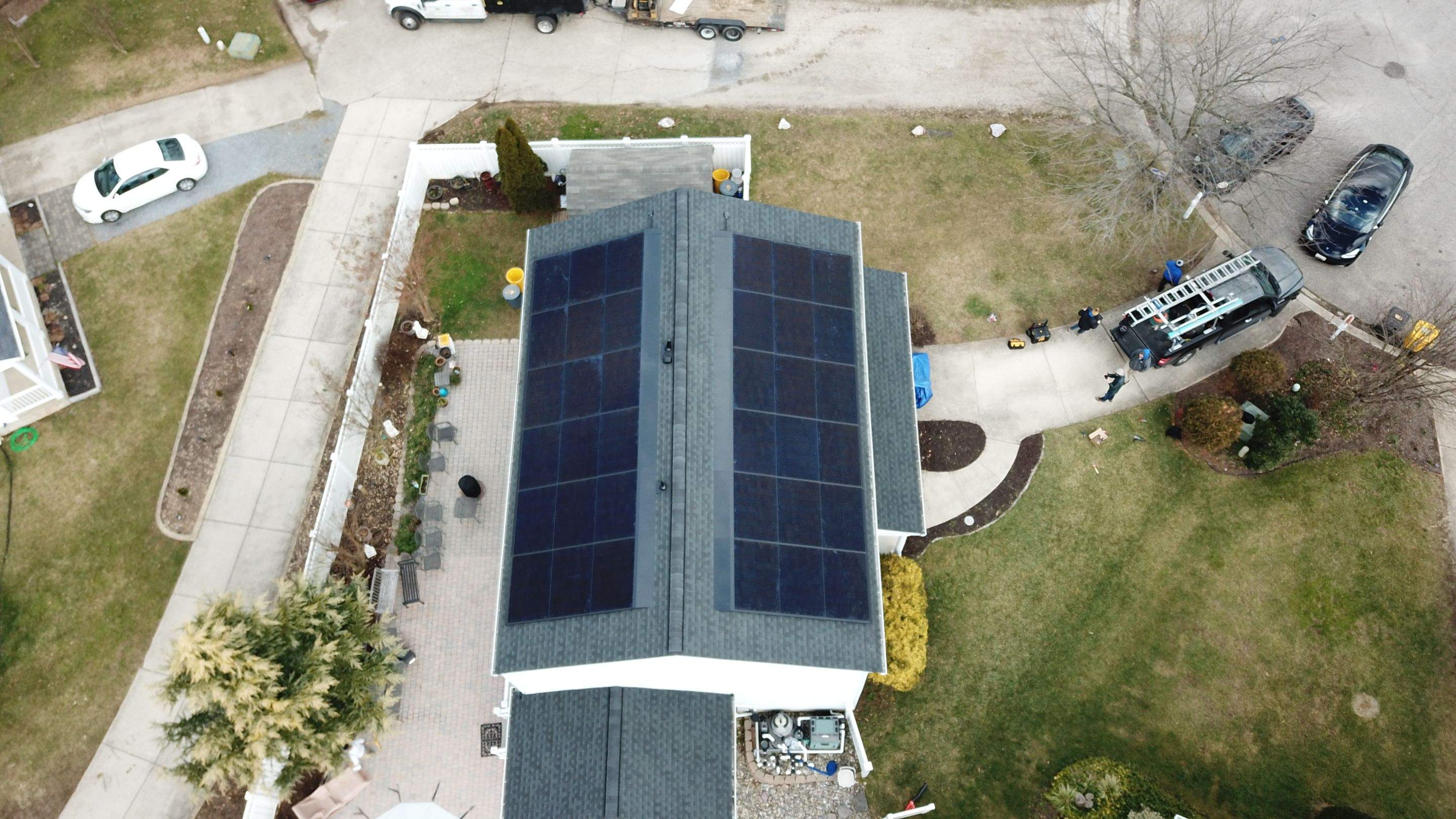 Roof Replacement with GAF Decotech integrated solar panels by American Home Contractors
