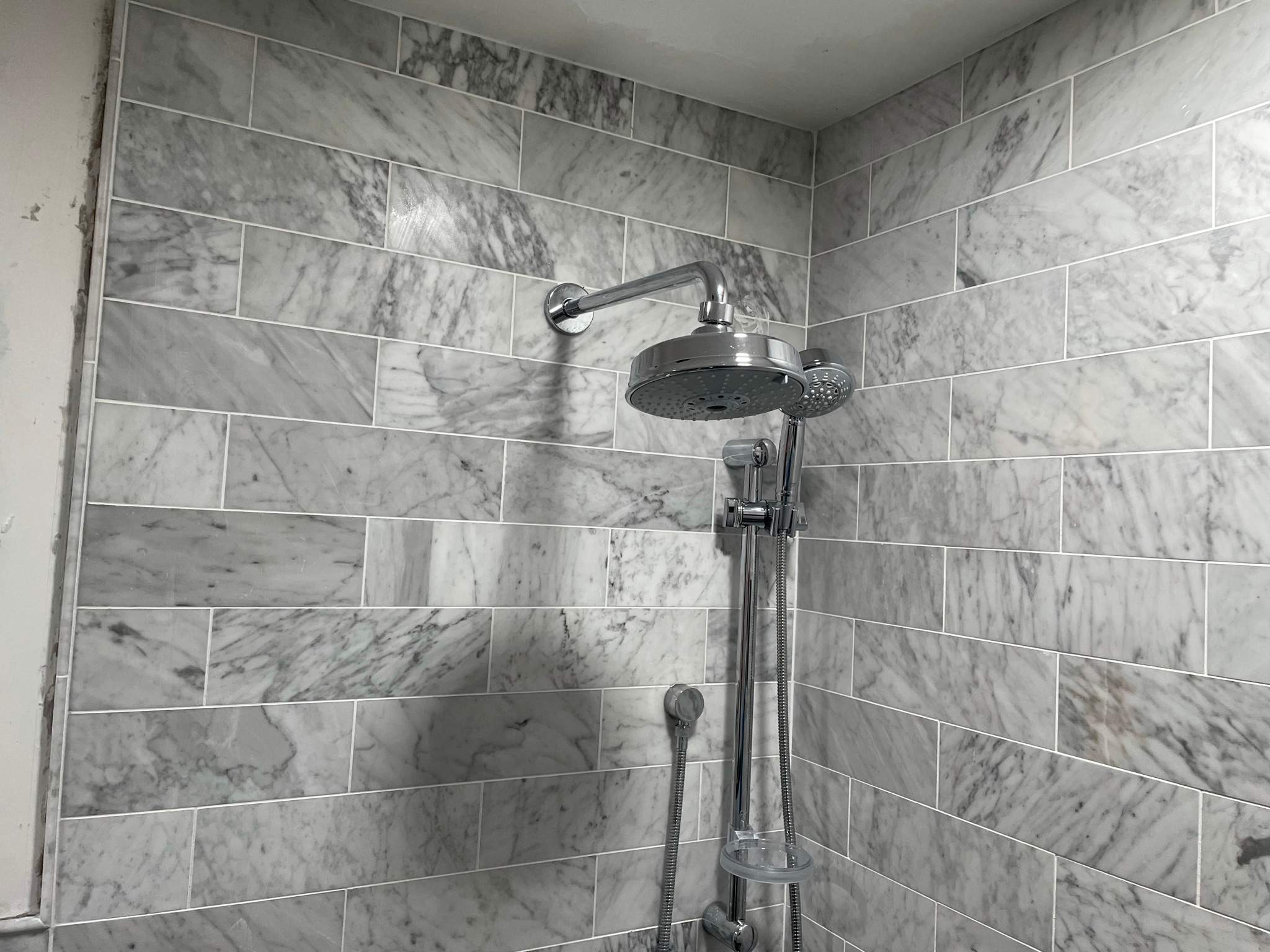 Bathroom Remodel using Tile by Home Concepts Construction