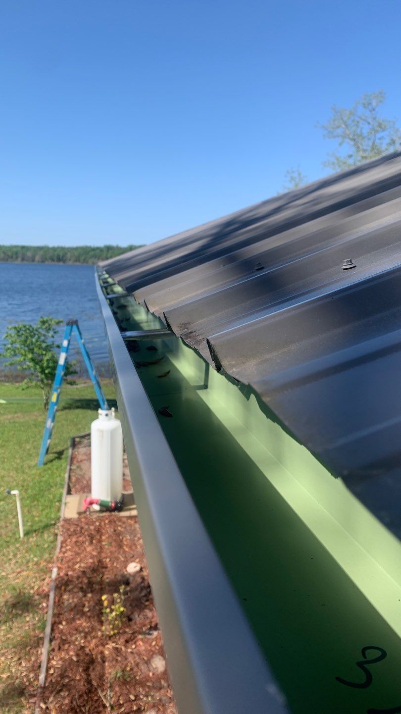 Gutter Installation Using Charcoal Grey K-Style Seamless Aluminum Gutters by Gutter Professors