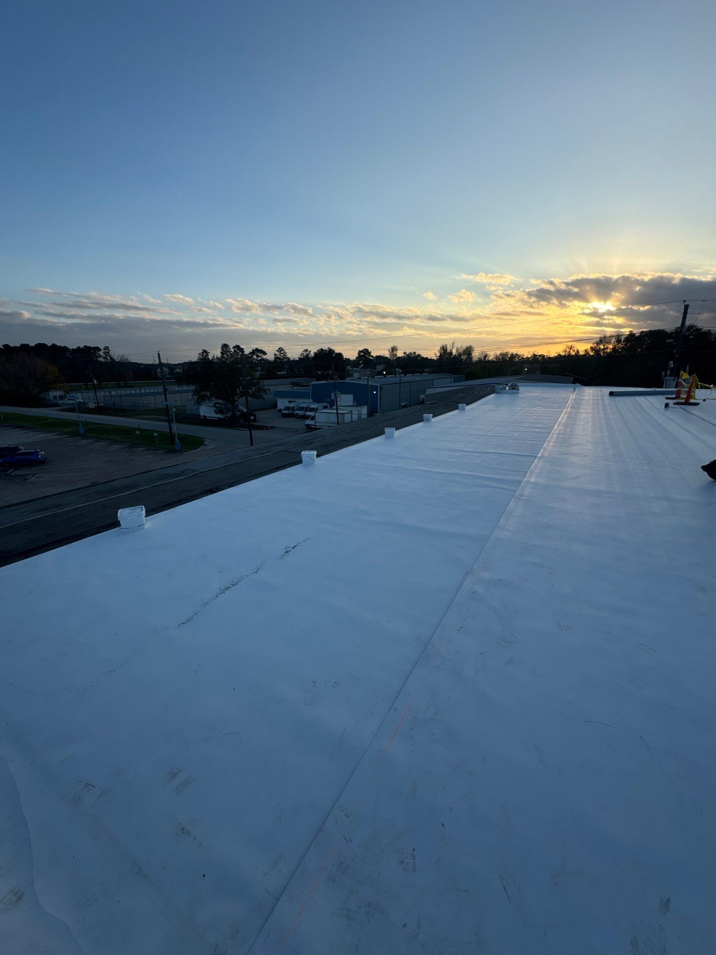 Commercial Roof Replacement using Carlisle Sureweld TPO at Ferguson Plumbing by Roof Experts