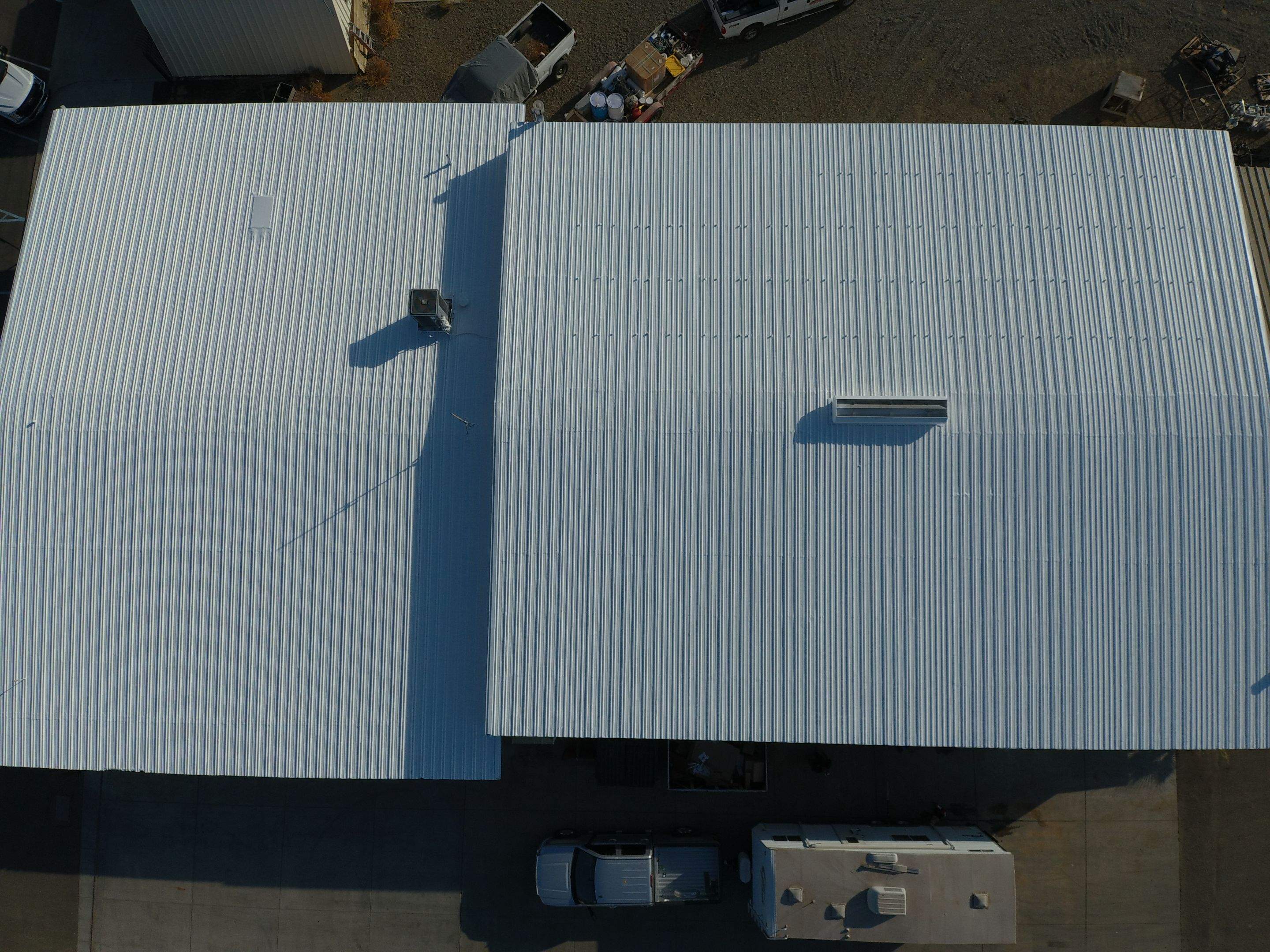 Metal Restoration Roofing system with Benchmark/PUMA XL 20 yr warranty by Straight Edge Roofing Inc