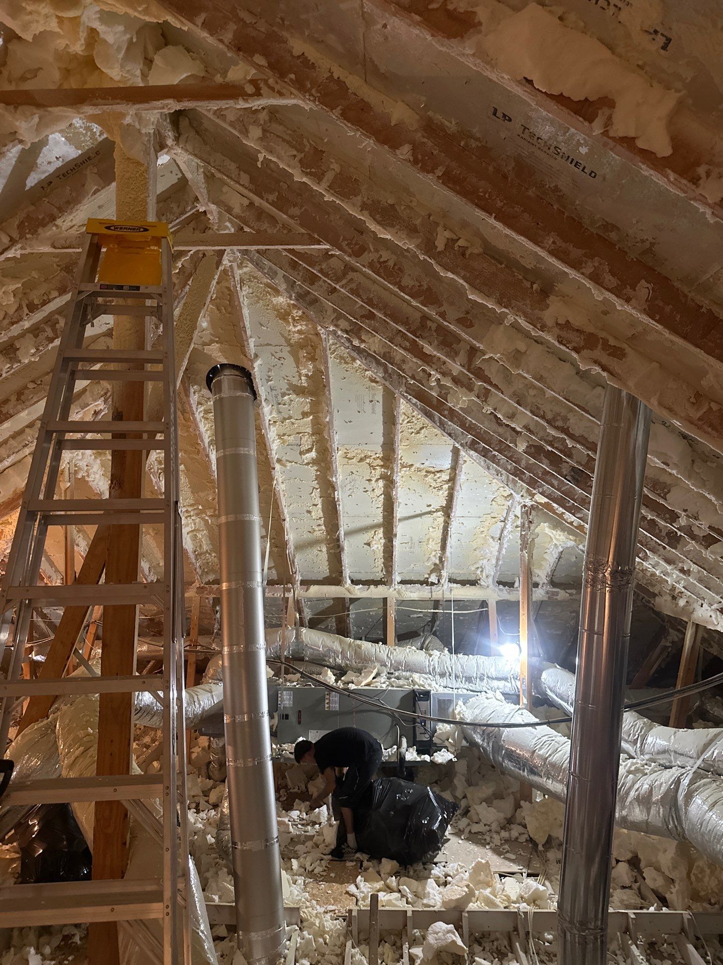 Spray foam insulation removal & re spray by Apex Insulation Solutions