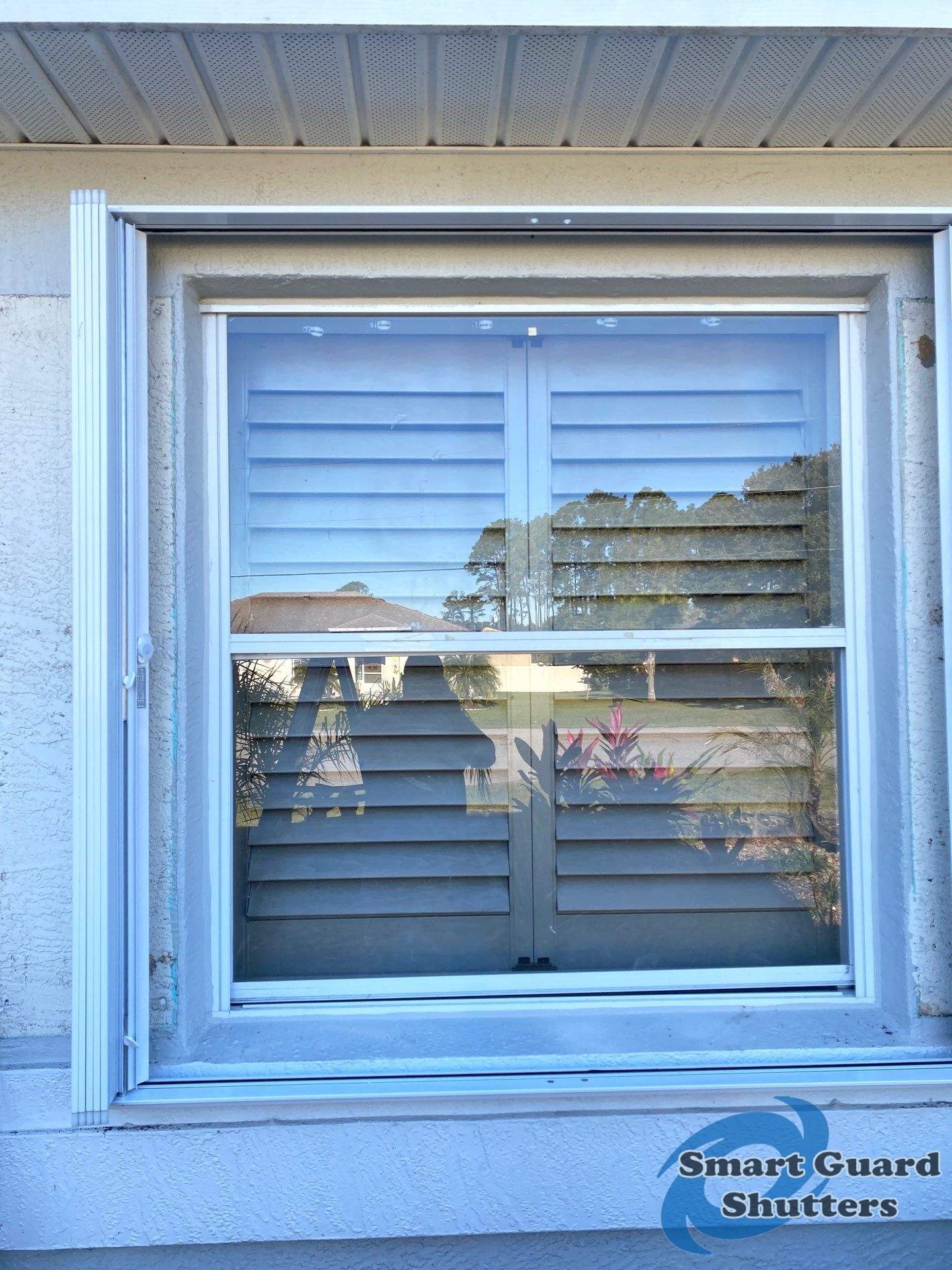 Accordions in White by Smart Guard Shutters