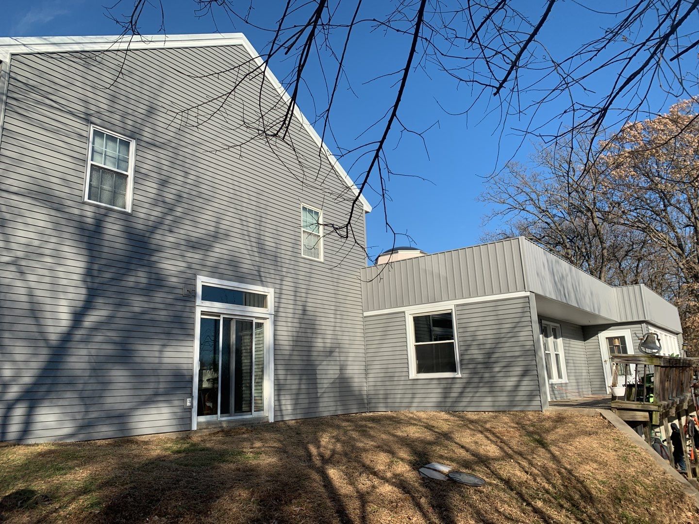 Contemporary house Siding Installation using Mastic Premium Vinyl siding  by EEC  Windows, Siding & Roofing 