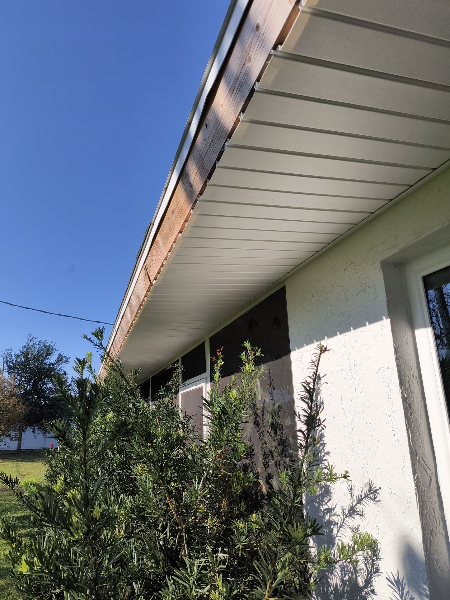 Aluminum White Soffit Installation in Sarasota FL by Gutter Professors