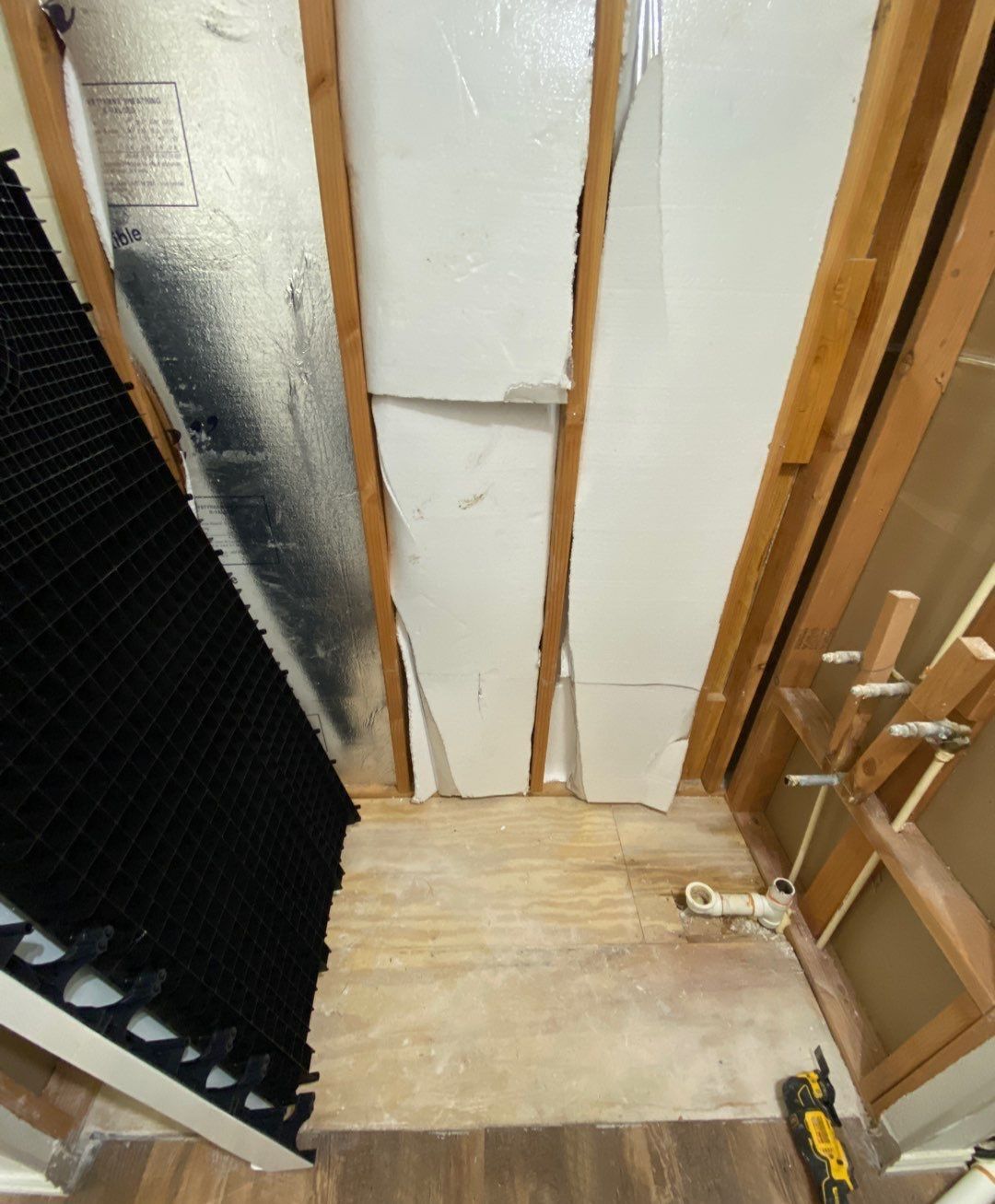 Bathroom Remodel using Tile  by SLM General Contractors & Roofing