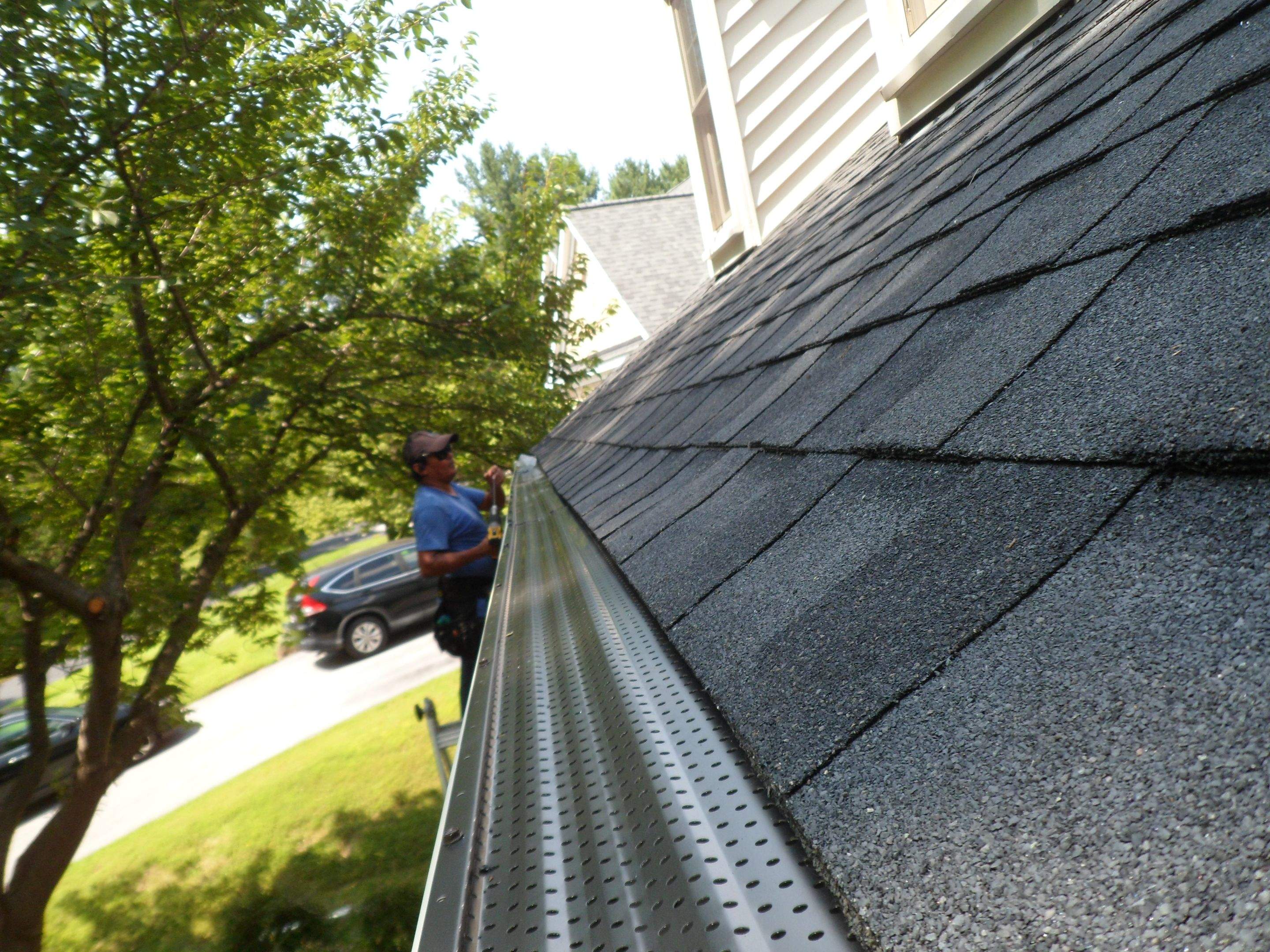 New Shingle Roof & New Gutters and downspouts with covers by Alpha Design Services