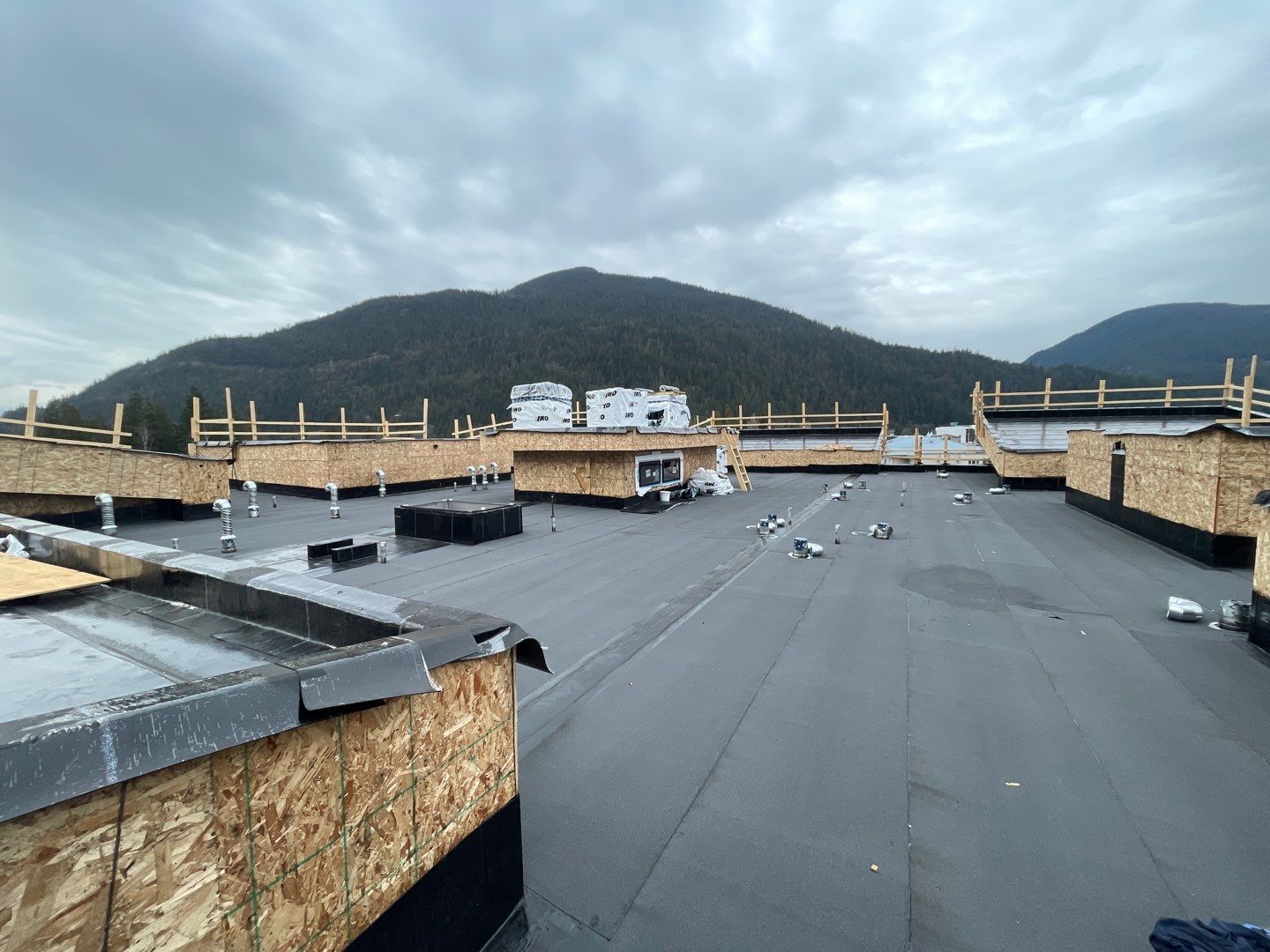 Commercial Roofing Installation using IKO 2ply sbs  by Top Notch Roofing Inc