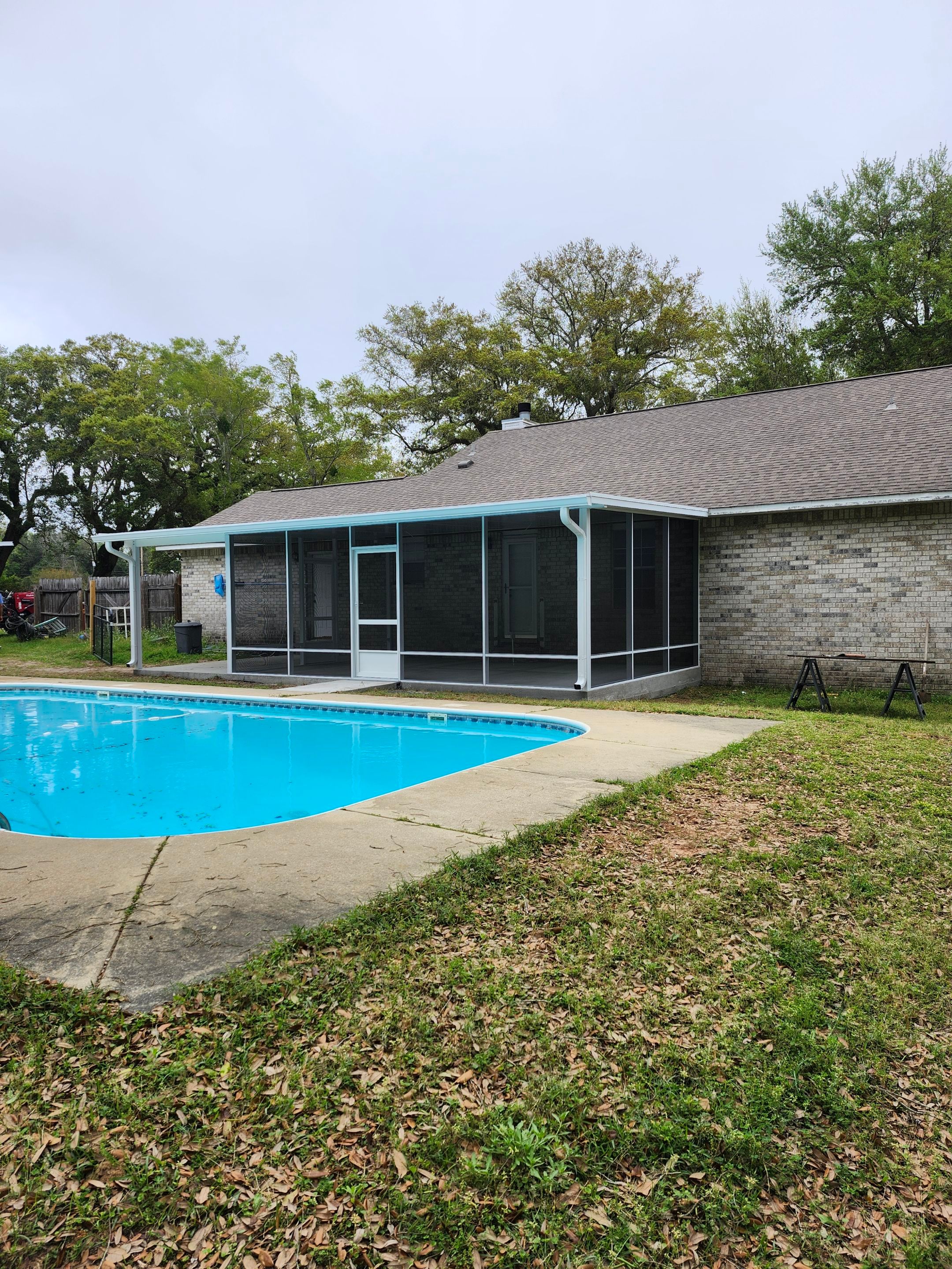 Poolside Screen Room in Pace by Titan Sunrooms
