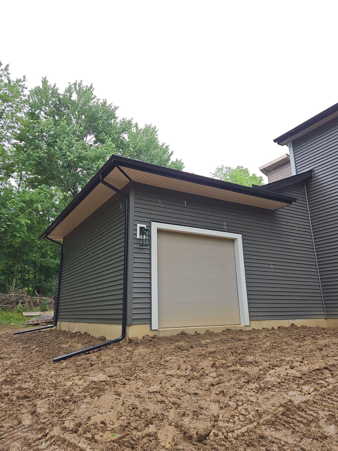 Gutter Installation using 5" Seamless Gutters and Downspouts by RoofX 