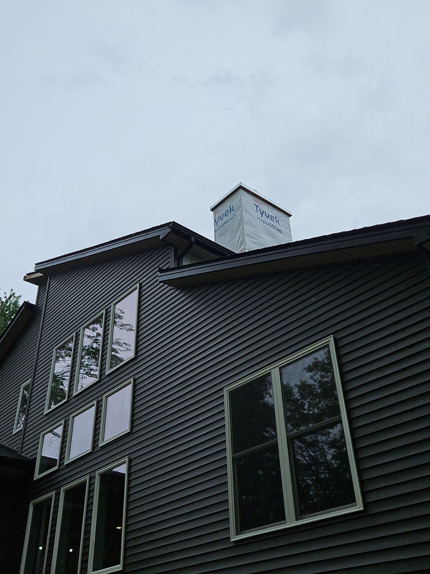 Gutter Installation using 5" Seamless Gutters and Downspouts by RoofX 