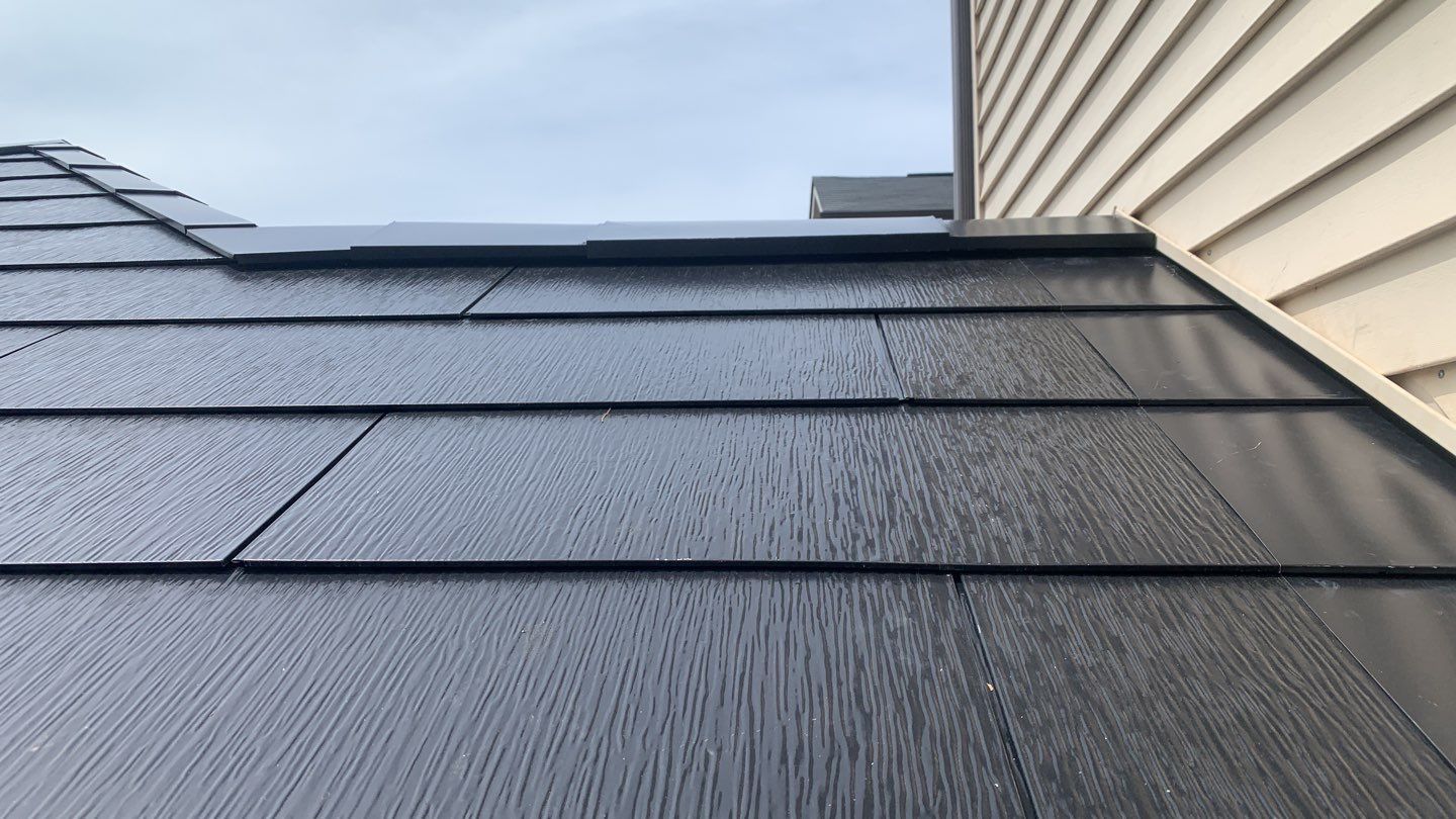 Tesla Solar Roof using Tesla Solar Roof V3 tiles by American Home Contractors
