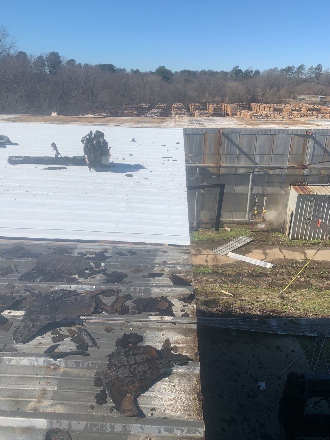 Commercial Roofing Installation using Aluminum Roofing panels by Hostetler Roofing