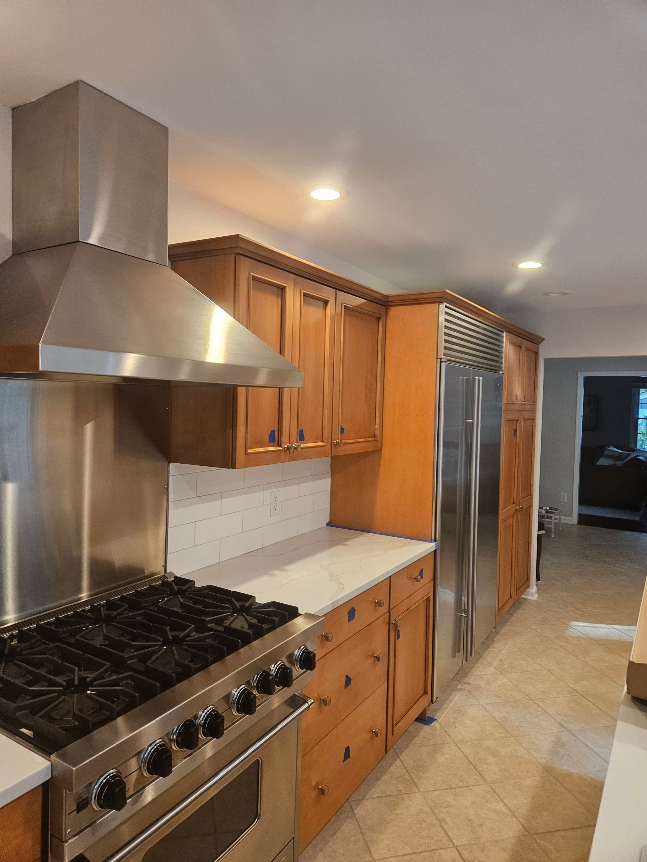 Chic Kitchen Cabinet Refinishing Project by Spectrum Painting, LLC