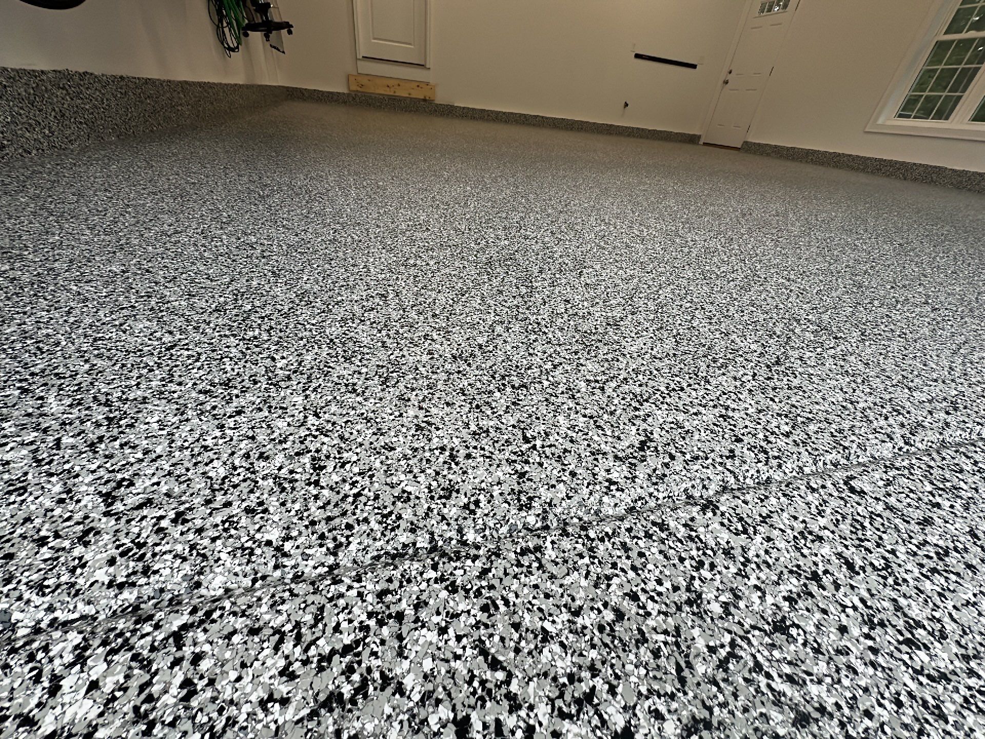 Garage in Norfolk, MA 02056 by Symphony Concrete Coatings