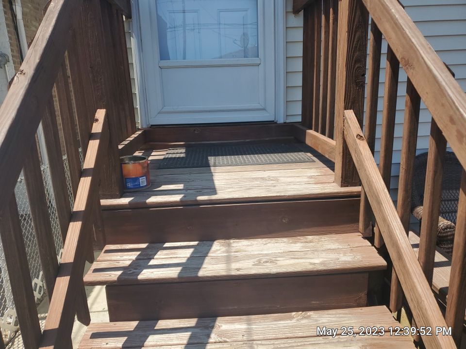 Wood cleaning and staining using Armstrong cloark oil stain by Northern Power Washing LLC.