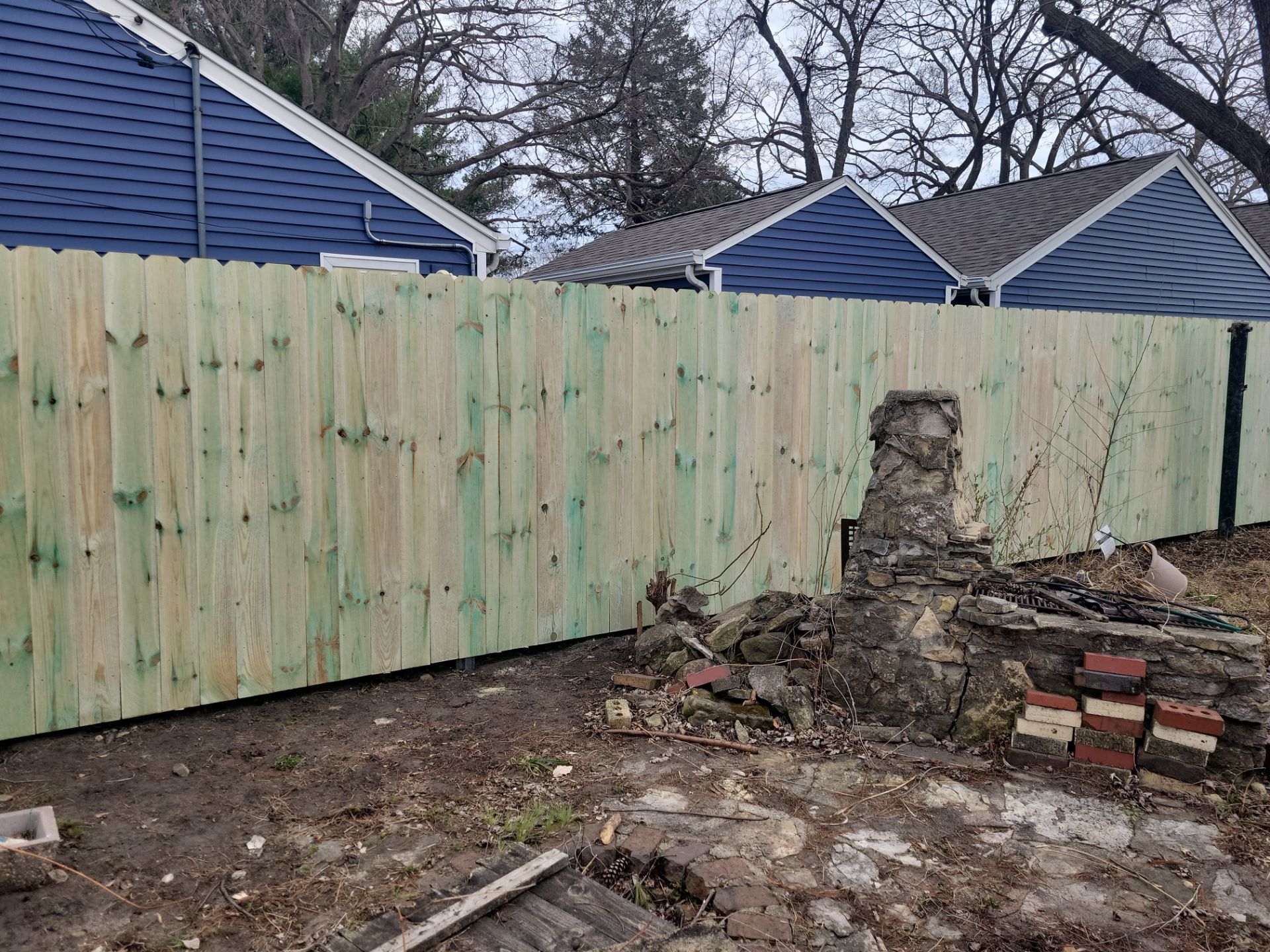 Custom Wood Privacy Fence and Gate Installation in Waterloo by Perfect Picket Fence and Stain