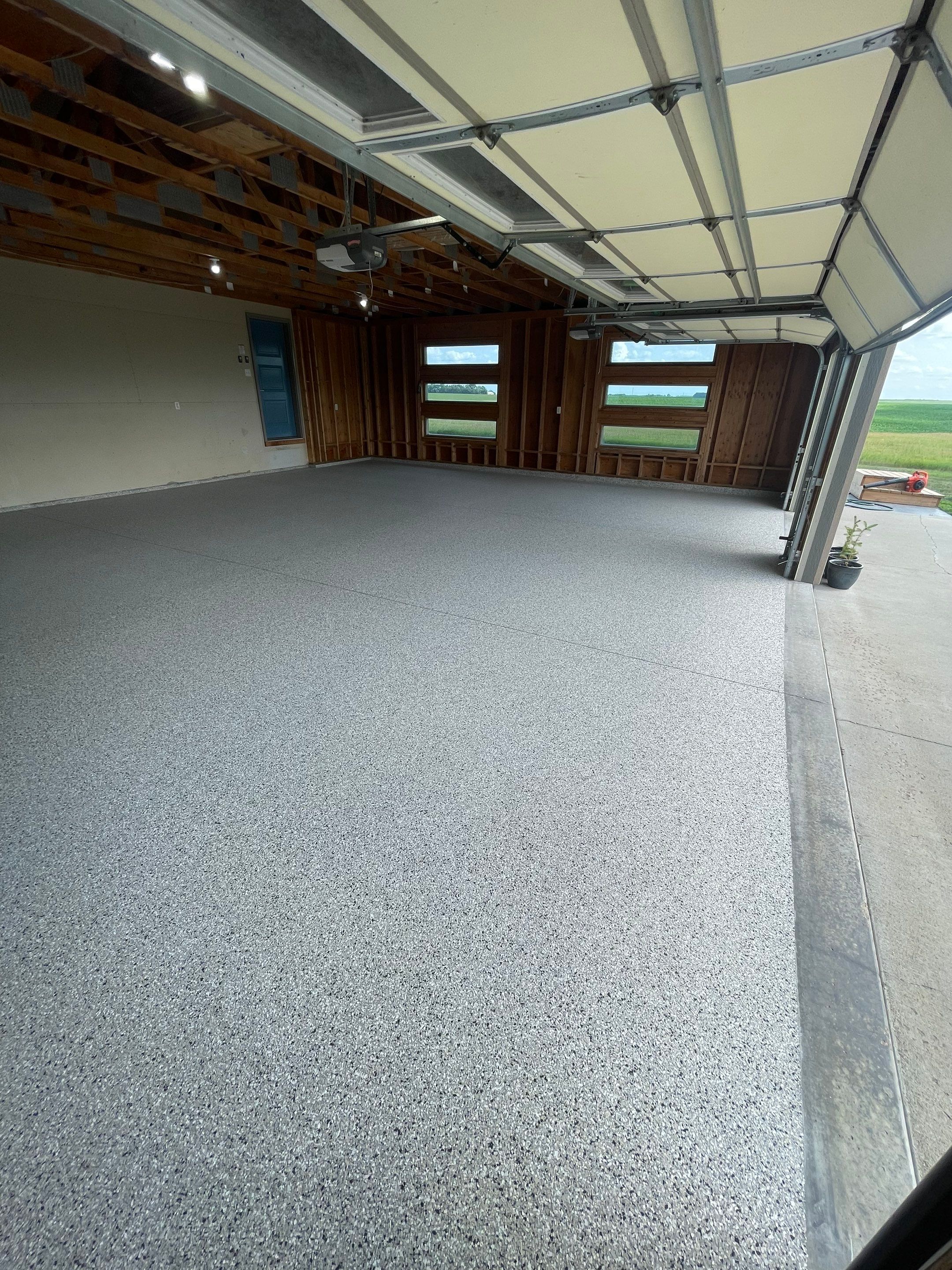 Cabin Fever Coating for Detached Garage in Dell Rapids by Select Painting, Coatings & Garage Cabinets