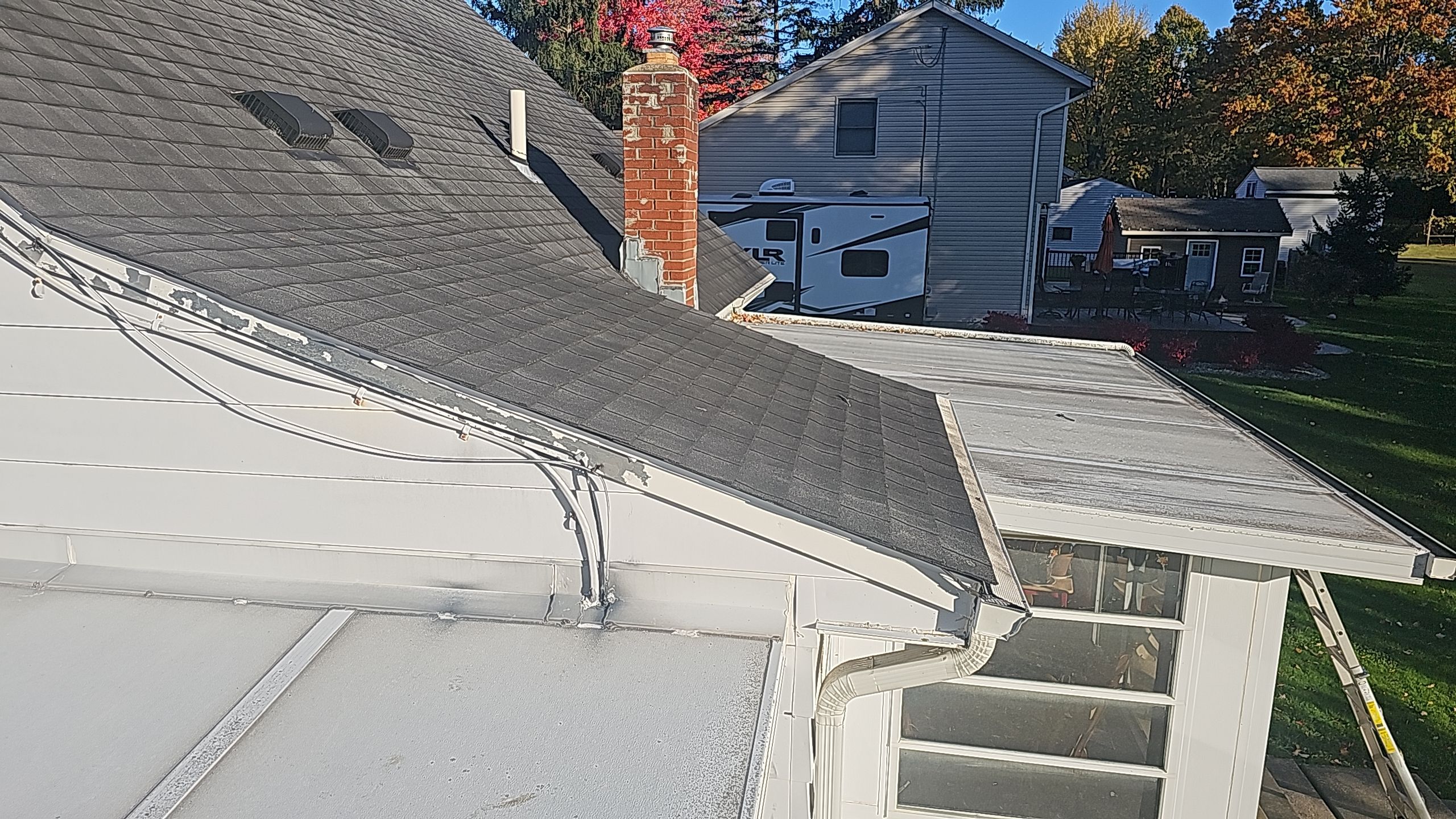 ATLAS PINNACLE COLOR: BLACK SHADOW DRIP EDGE: WHITE by Eagle Eye Roofing
