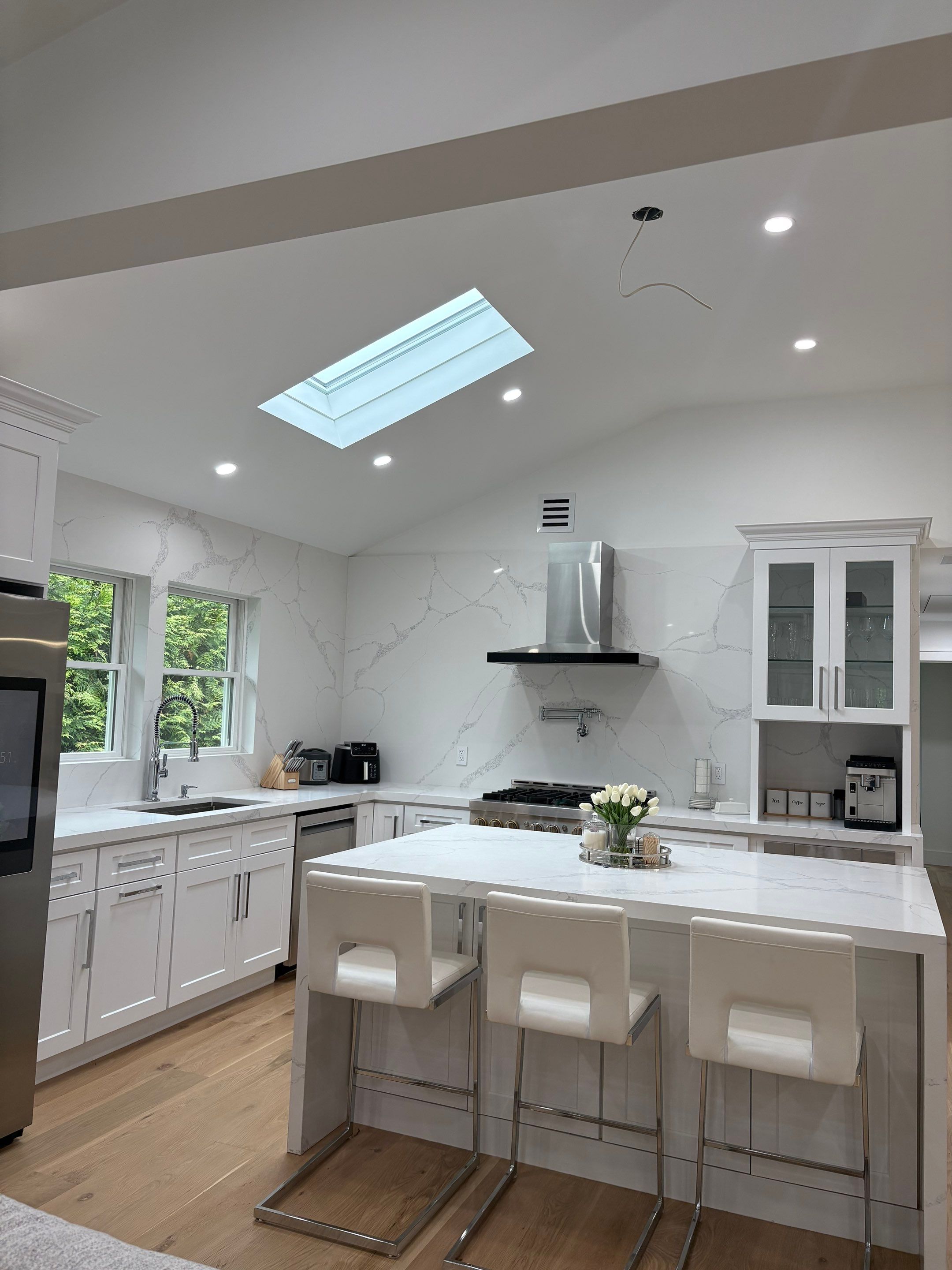 Cabinet Installation using white shaker by Antrax Corp
