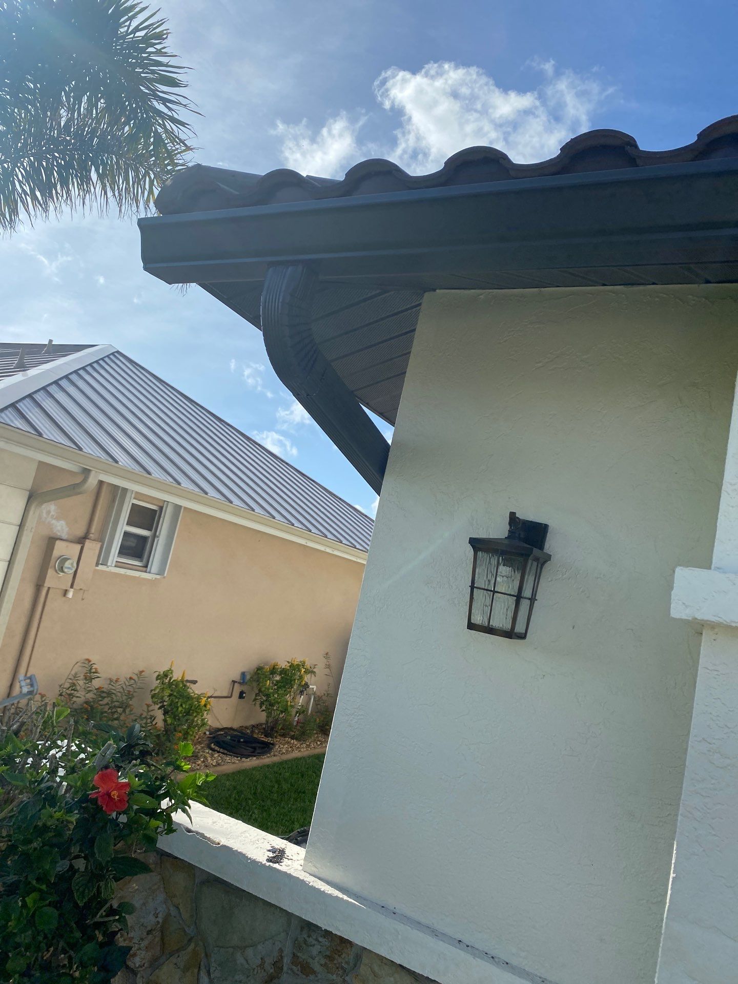 Black Seamless Gutters for Modern Homes in Punta Gorda by Gutter Professors