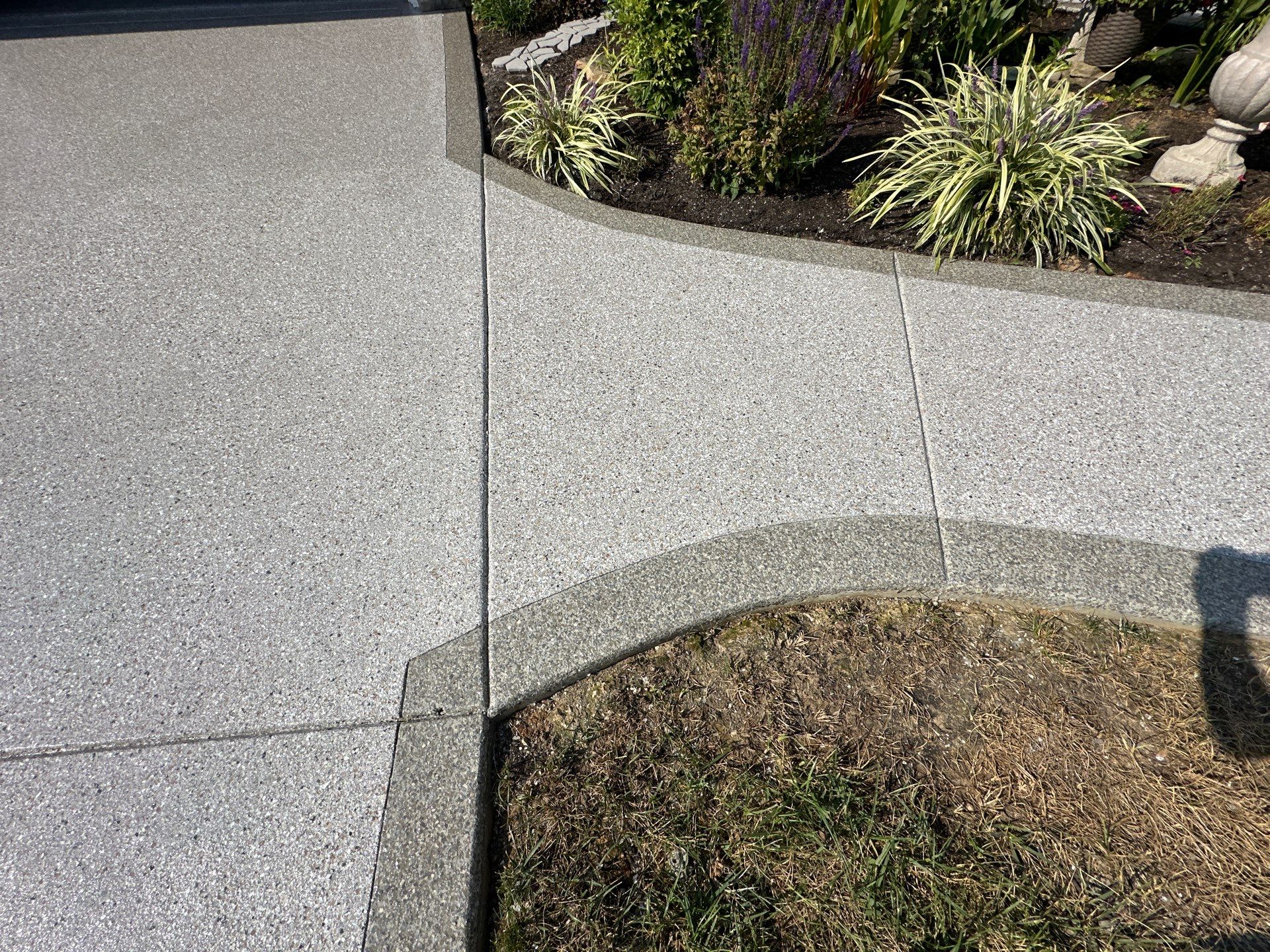 Driveway Improvement Using Claystone With Trail Mix Border! by Elite Floor Solutions