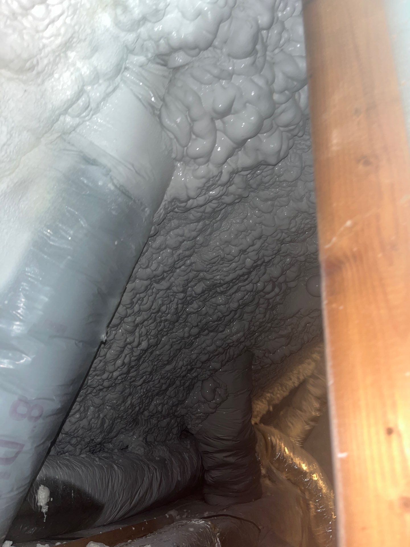 Attic Insulation using open cell spray foam by NYS Foam & Energy