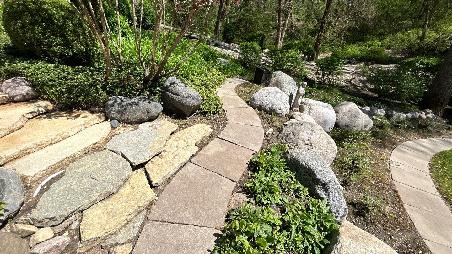 natural stone using Algaecide, soft wash soap by Northern Power Washing LLC.