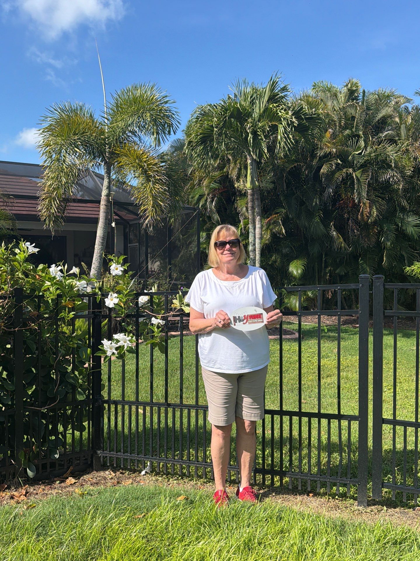 customer with puppy picket aluminum  by H&Y Fence