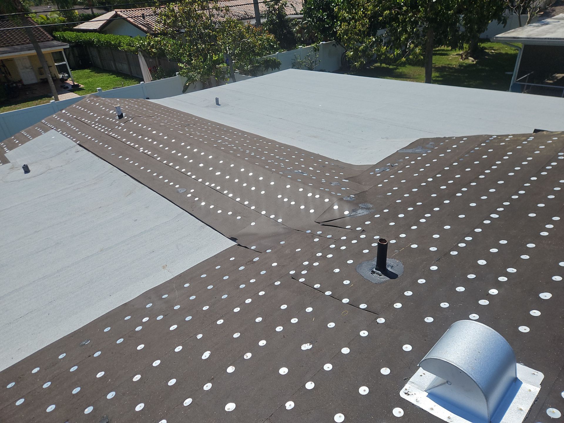 Residential Roofing Installation using 1" Nail strip metal roof by BLUES BROTHERS ROOFING