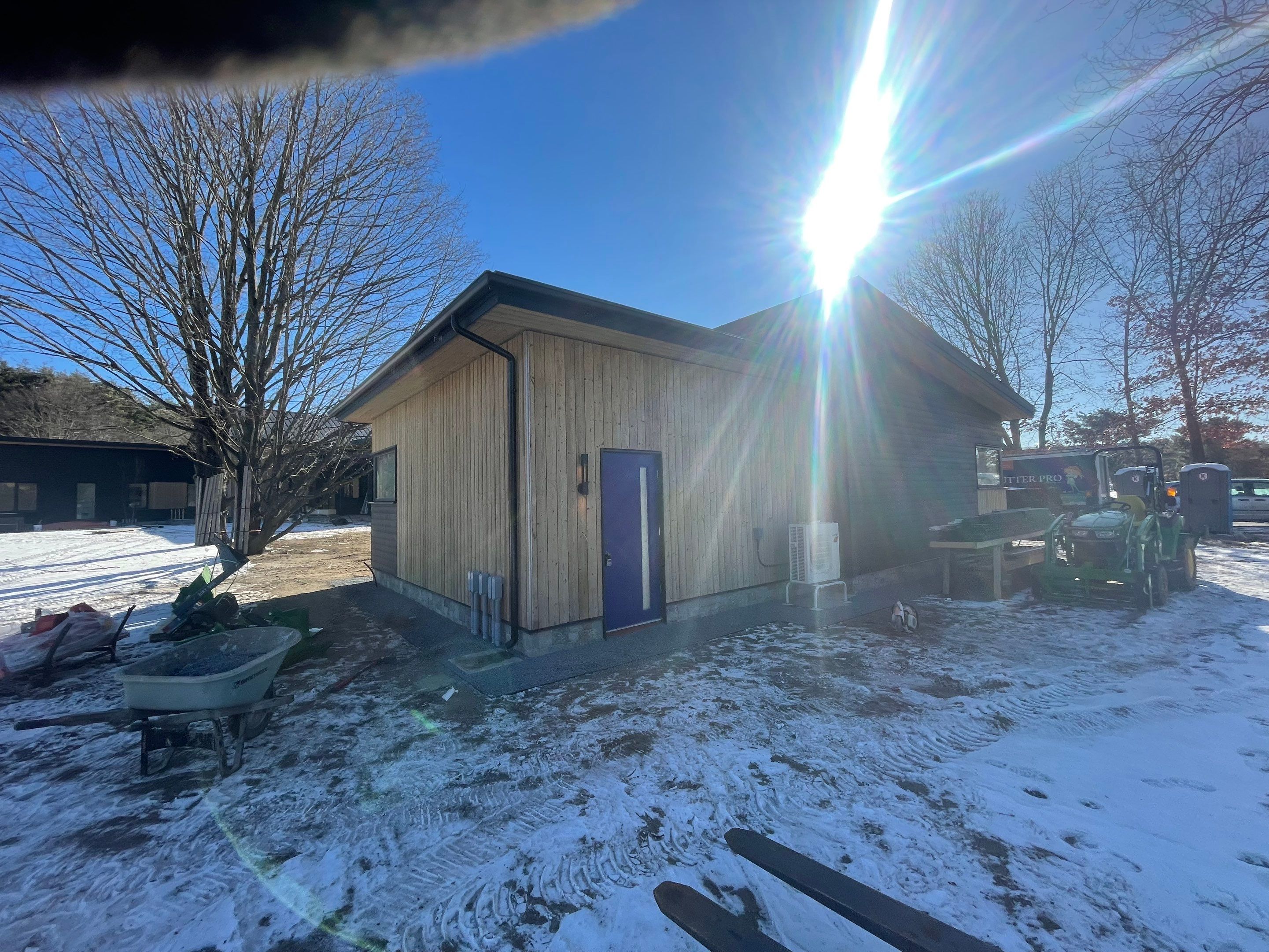 Gutter Installation using 6" Half Round Aluminum Gutter with 3" plain round aluminum downspouts and with a vinyl wedge buildout in Stow, MA. by Gutter Pro Enterprises