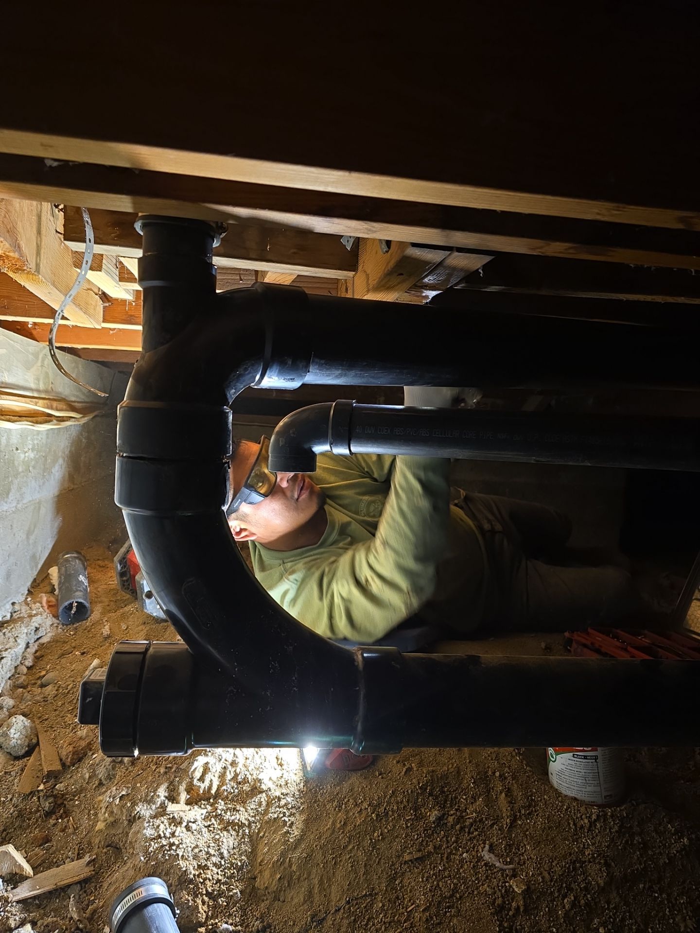 Installation of New Tall Black Piping (Wall to Ceiling) & Underground Piping by Us Plumbing