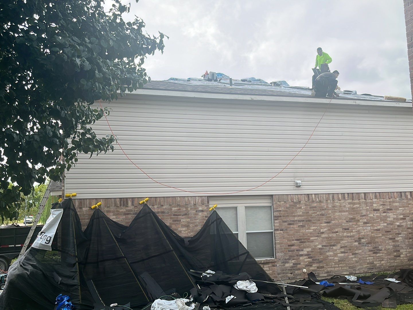Full Roof Replacement, Chimney Rebuild and Interior Damage Replacement by First United Roofing & Construction