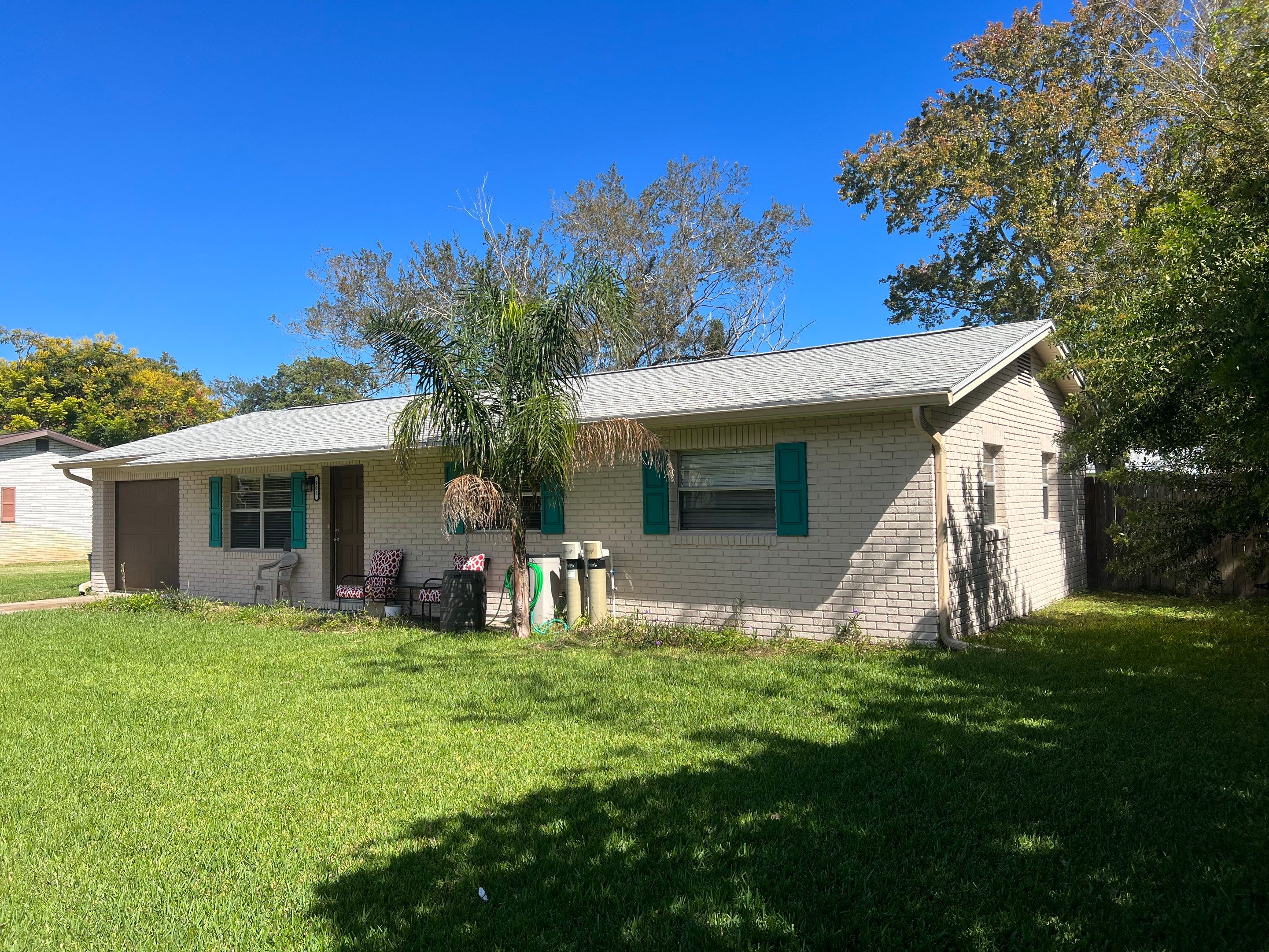 Single Reroof Replacement Daytona Beach FL by Pinnacle Roofing Group