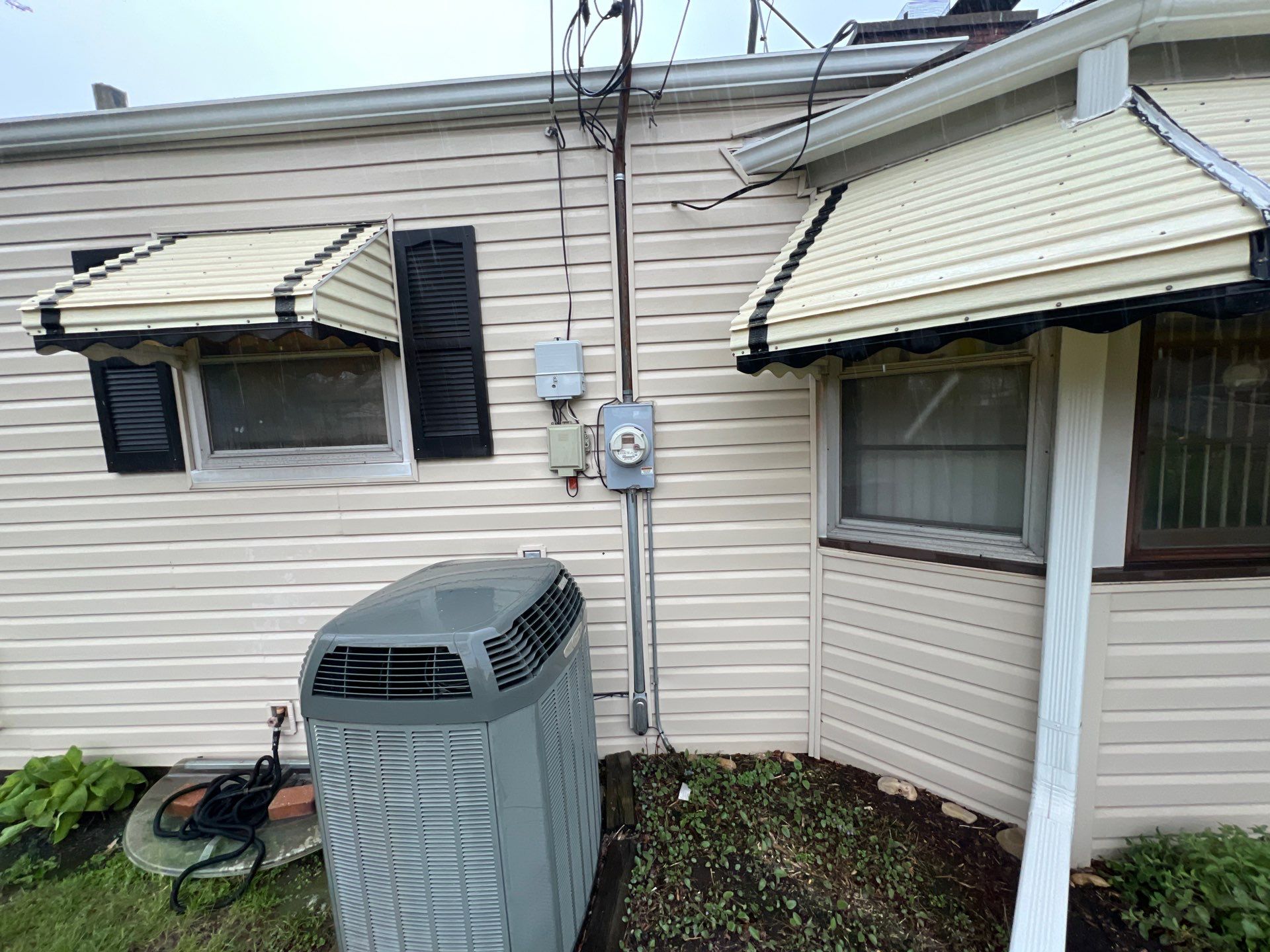 Housewashing  using Algaecide, soft wash soap by Northern Power Washing LLC.