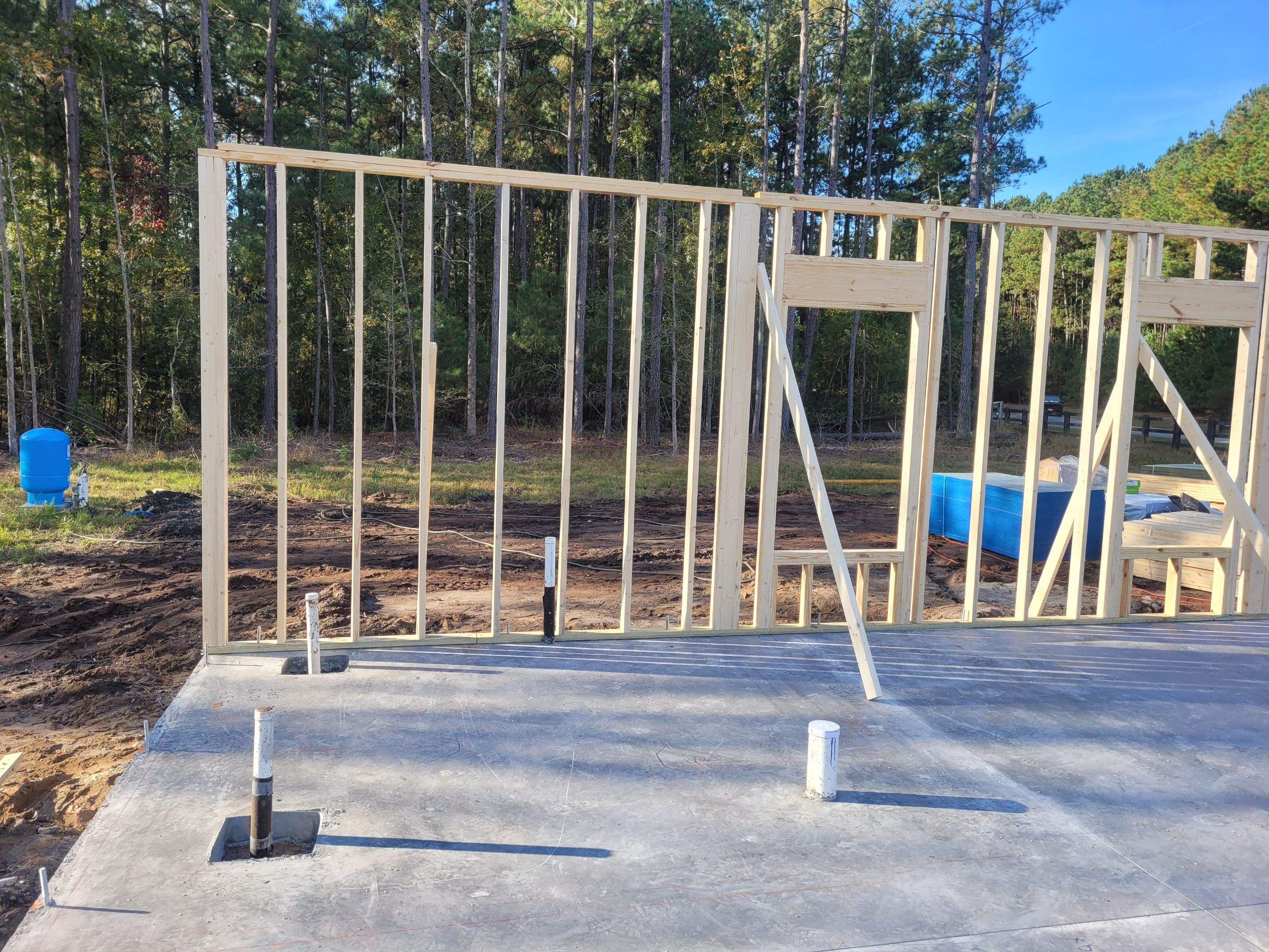 New Home Construction using brick and vertical vinyl by Cornerstone Home Builders, LLC