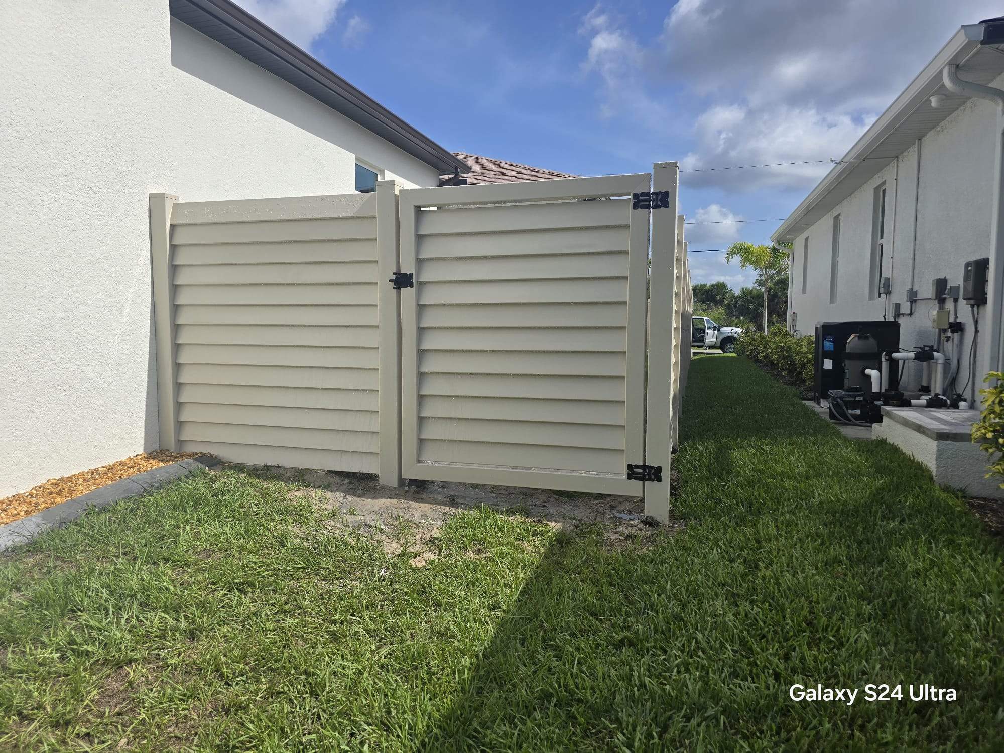 Tan Louvered Vinyl in Port Charlotte by True Fence LLC