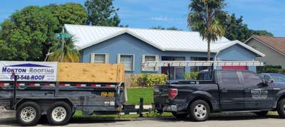 Standing Seam Metal & Flat Re-Roof using 1.5" Nail Strip 24ga Solar White Kynar Coated Standing Seam Metal Panels