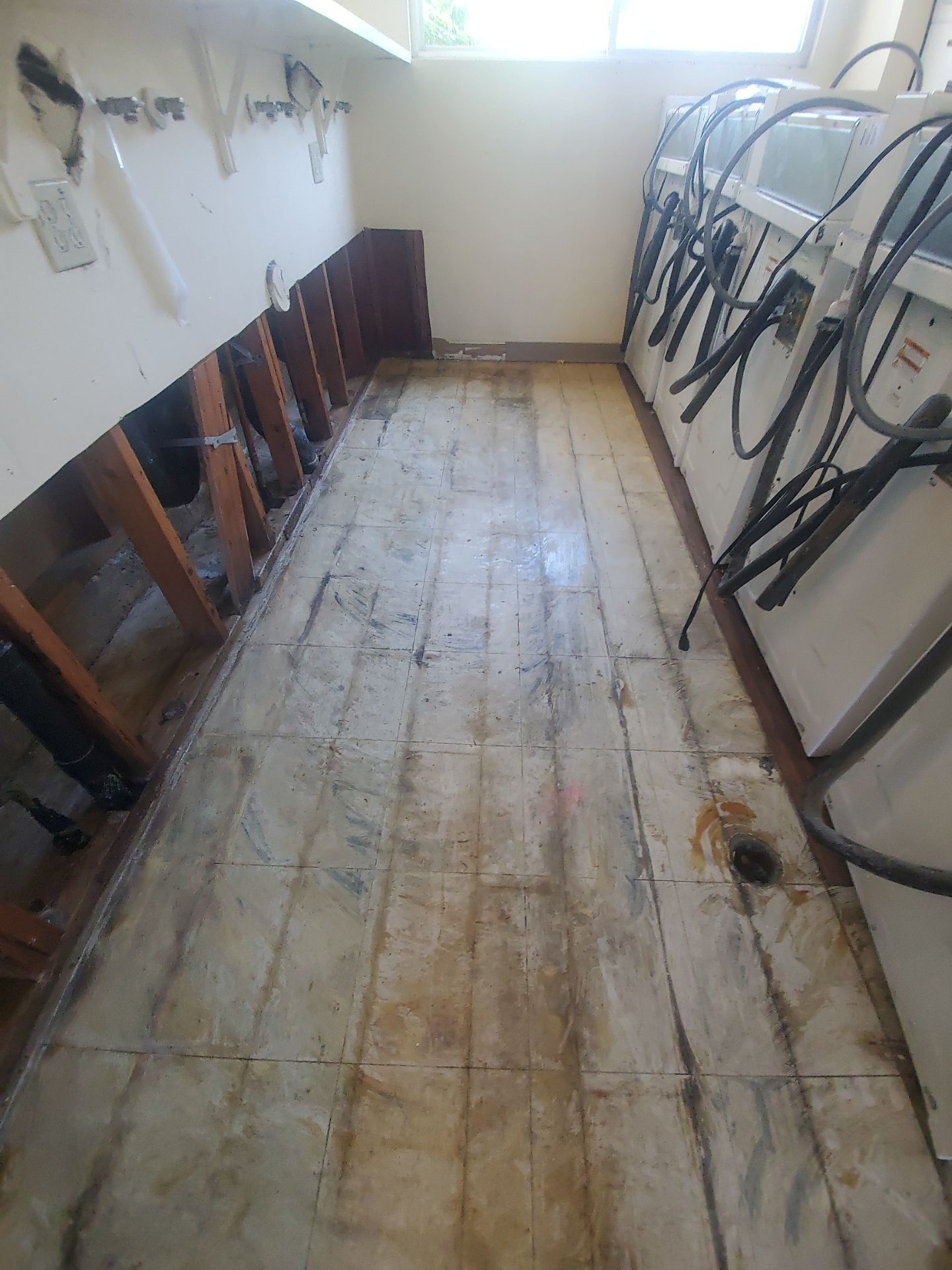 Laundry Room Water Restoration & Rebuild in Irvine by One Stop Source