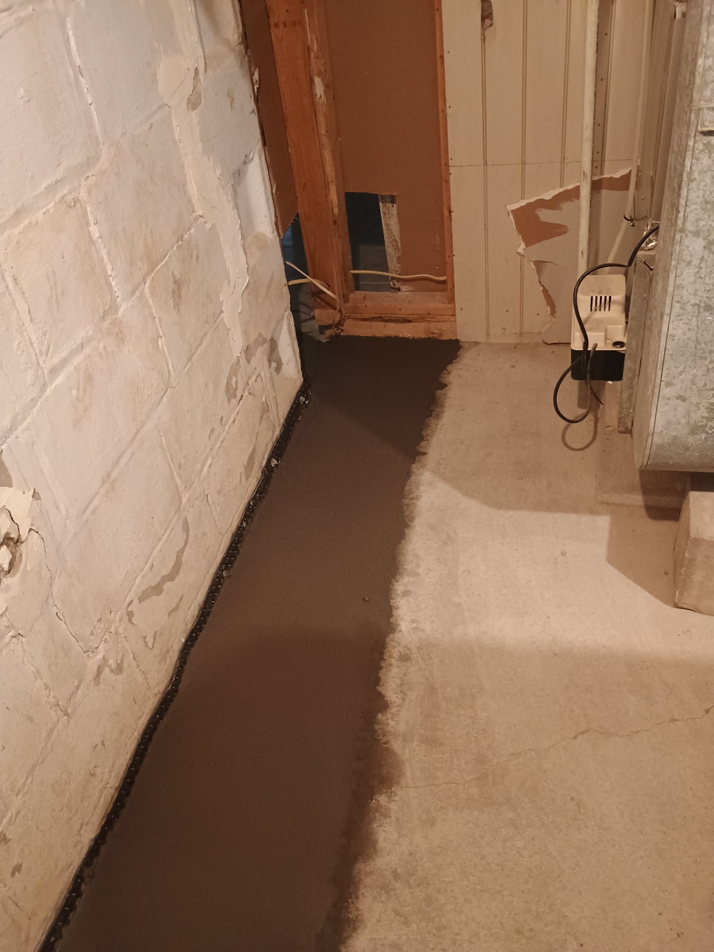 Drain Tile in Minneapolis for Kristen & Taylor by Waterproofing Northeast