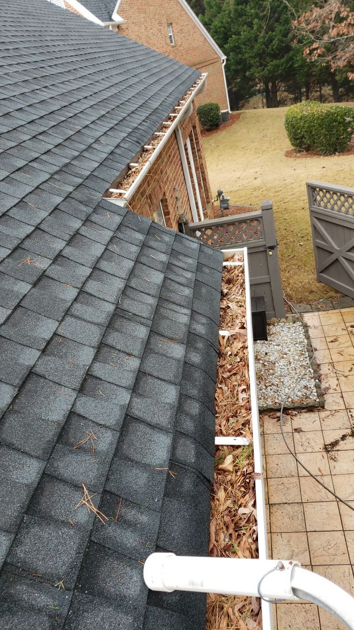 Gutter Cleaning using water by Power Wash Masters LLC