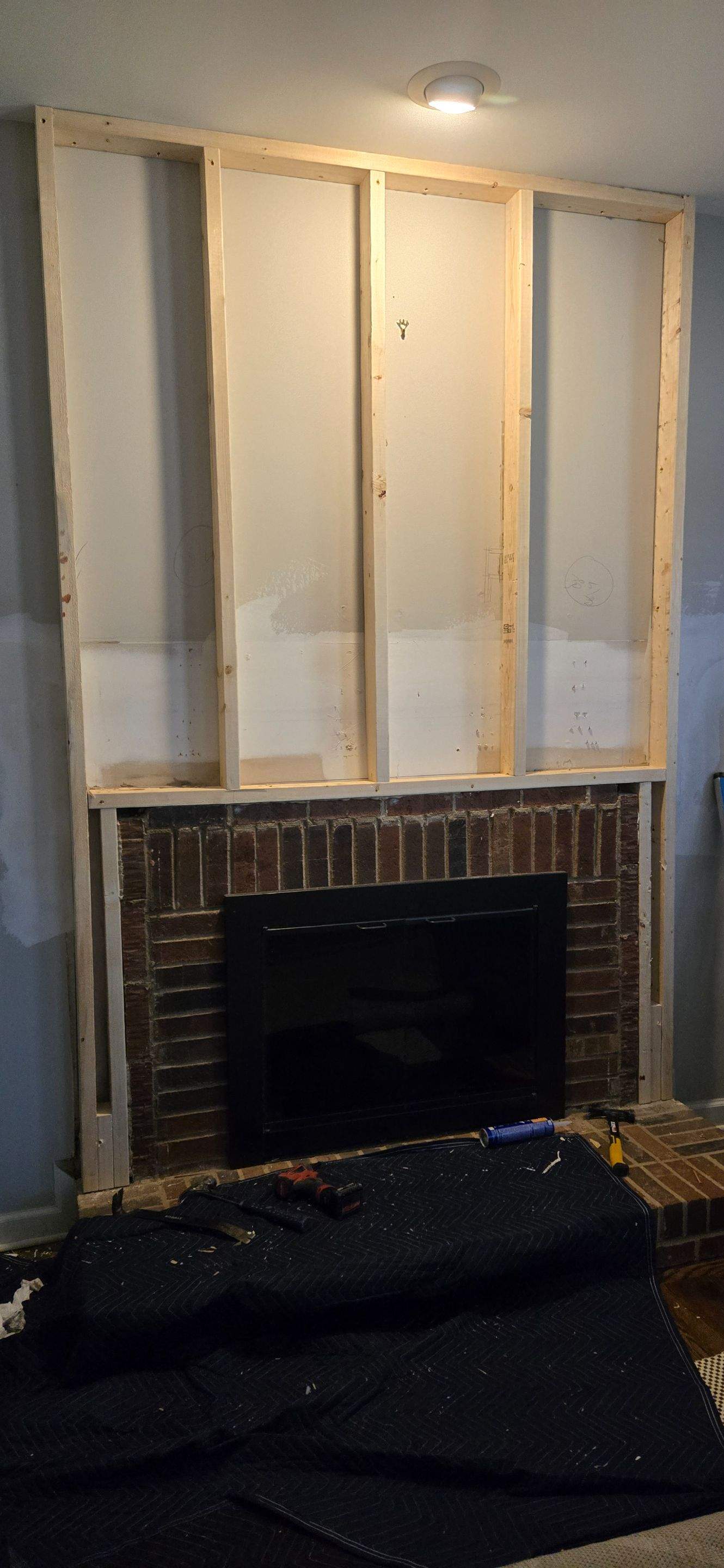Fireplace Trim Out using Ship Lap by A Step Above Handy LLC 