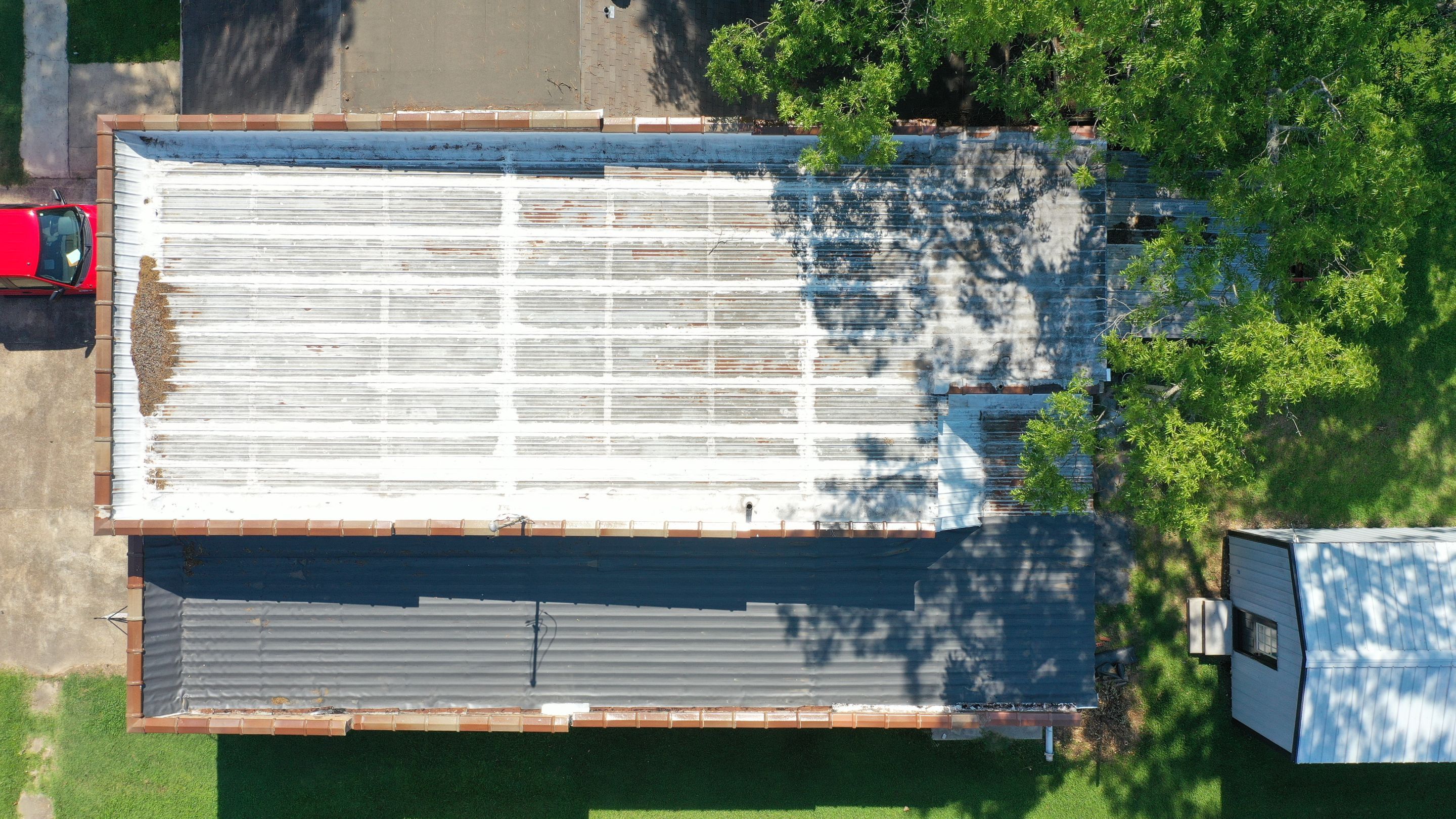 Commercial Roofing Installation using Aldocoat Coatings by Hostetler Roofing